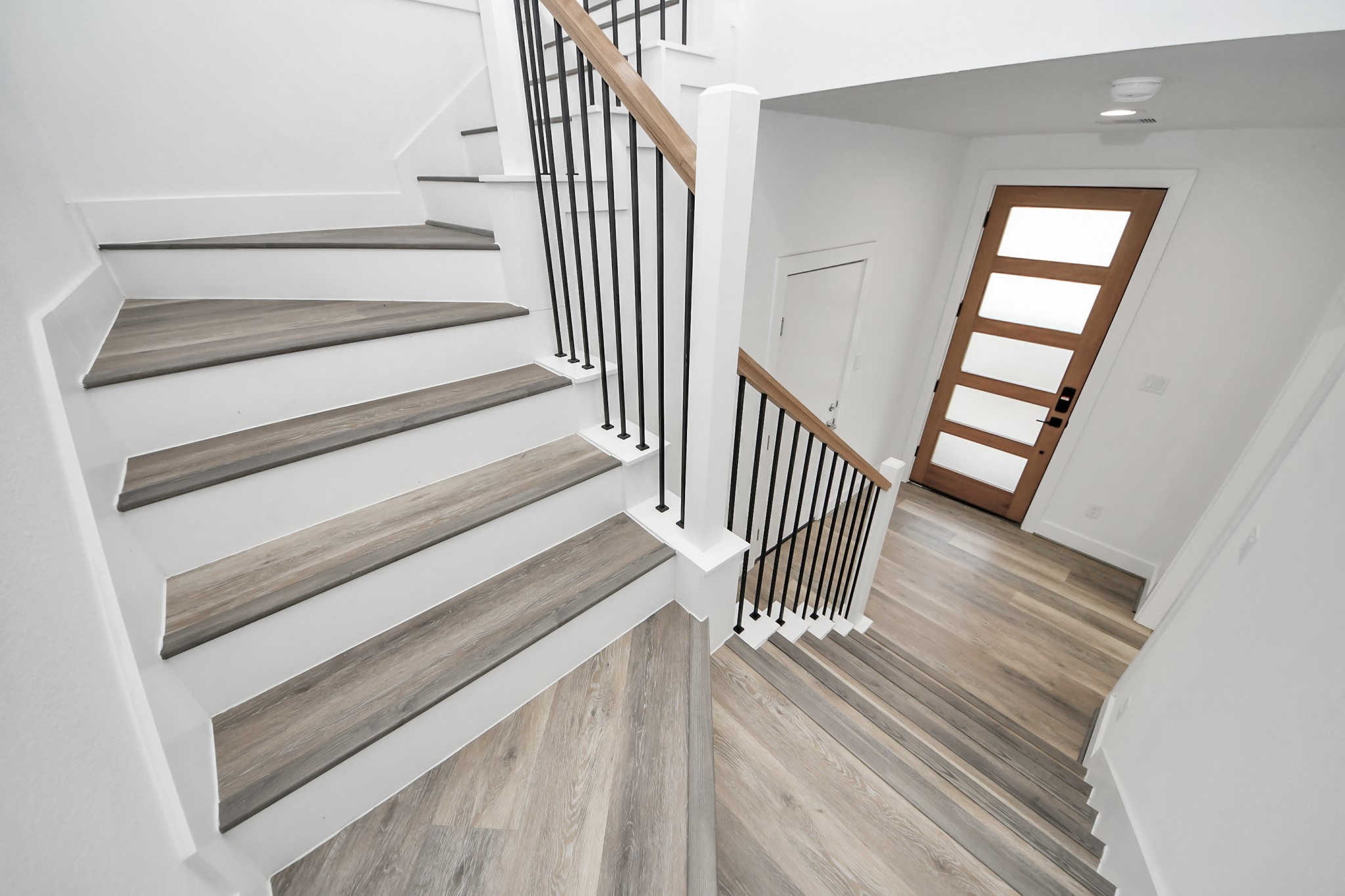 Stairs to second floor (Sample photo from same floor plan next to the address)