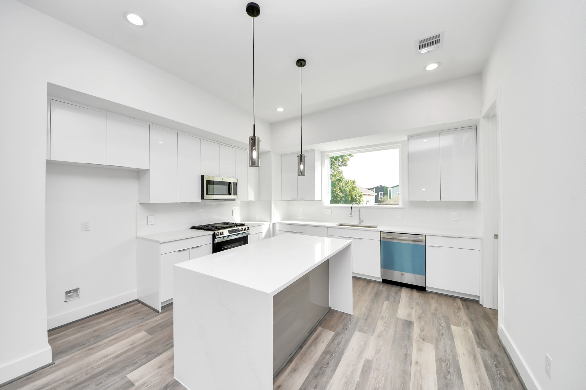 Kitchen with island on second floor (Sample photo from same floor plan next to the address)