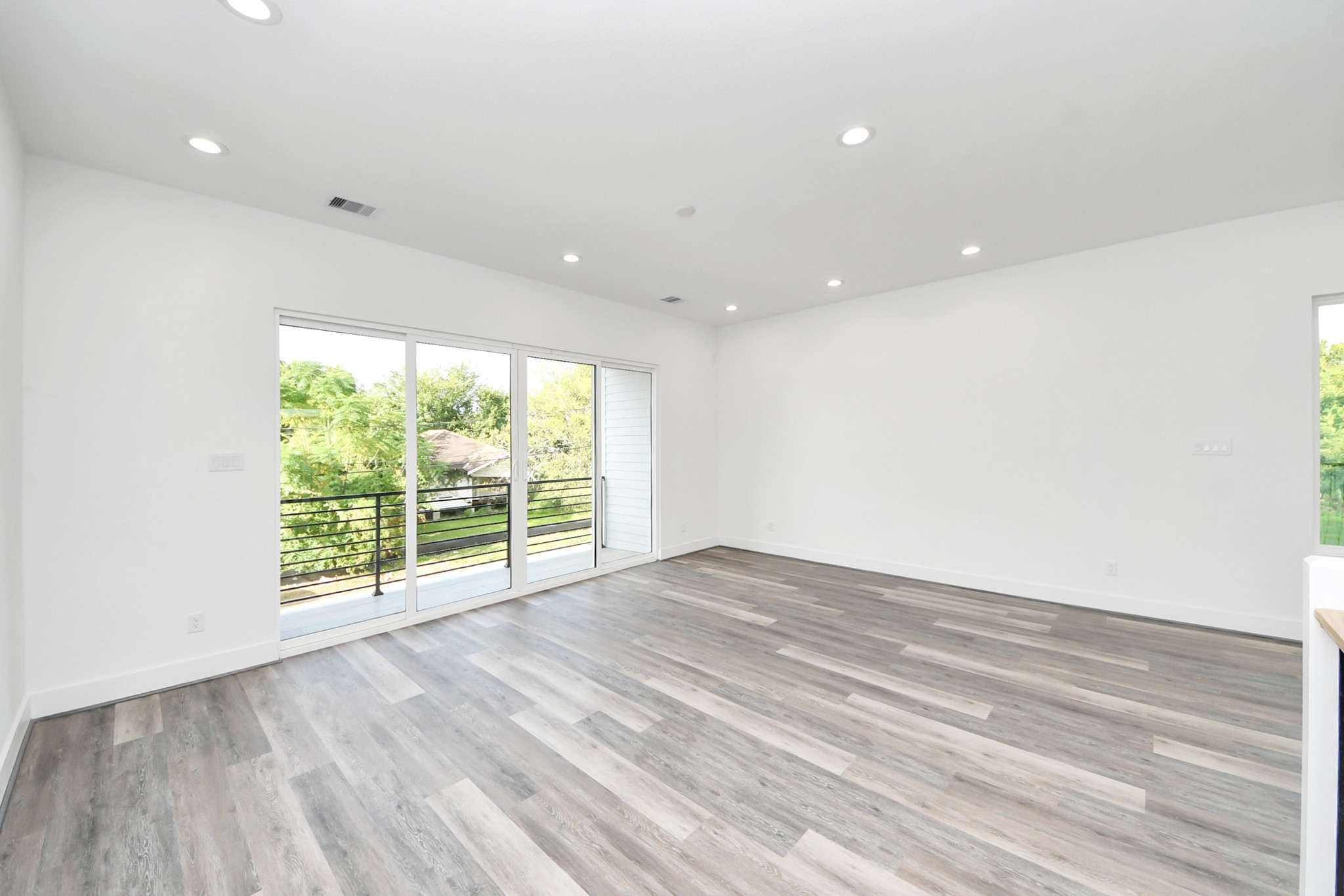 Open living room (Sample photo from same floor plan next to the address)