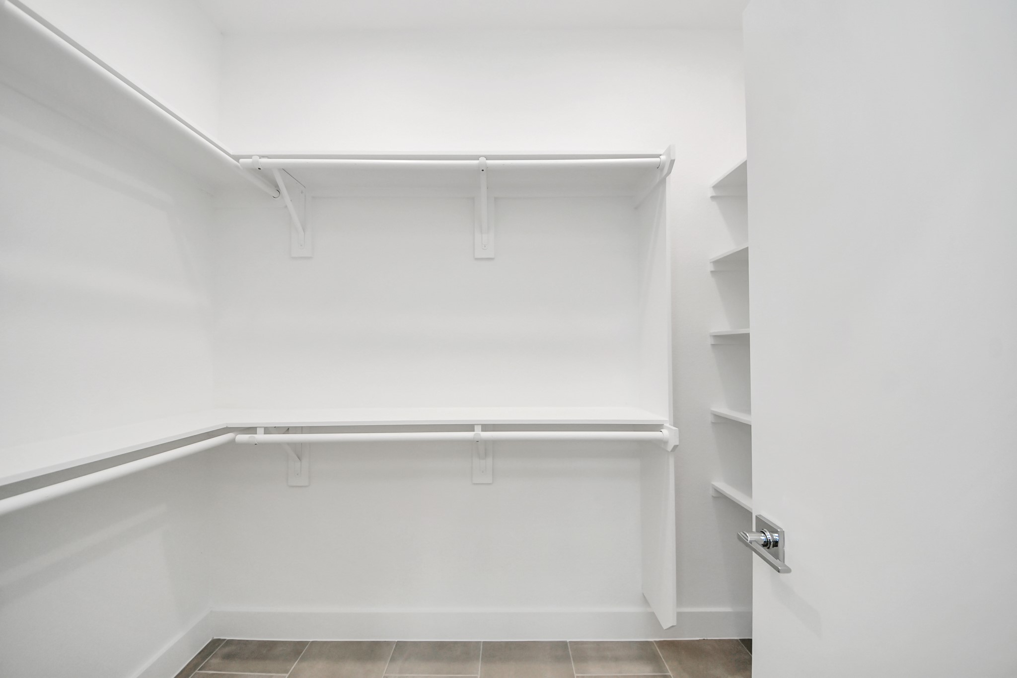 One of two primary closets (Sample photo from same floor plan next to the address)