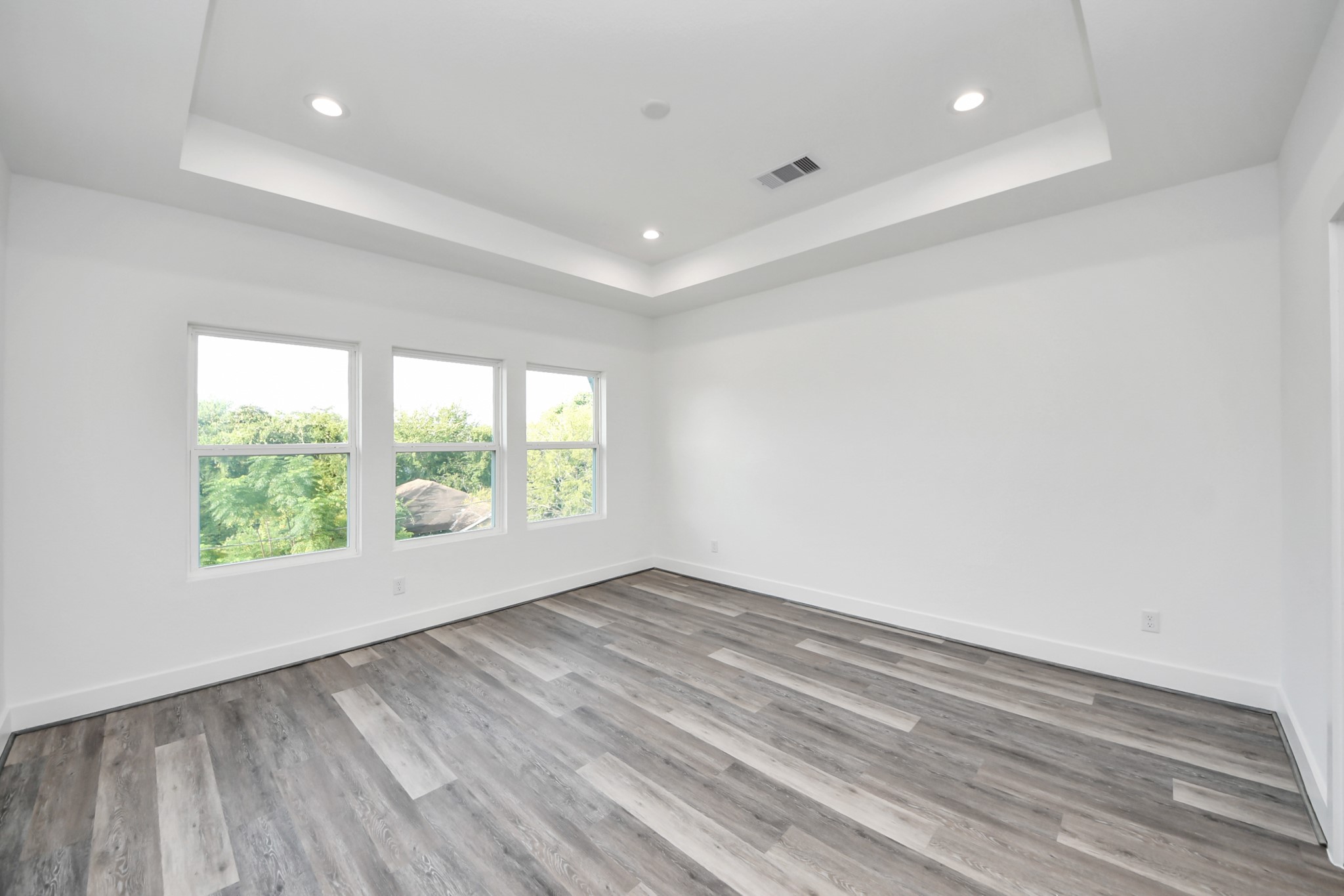 Primary bedroom (Sample photo from same floor plan next to the address)