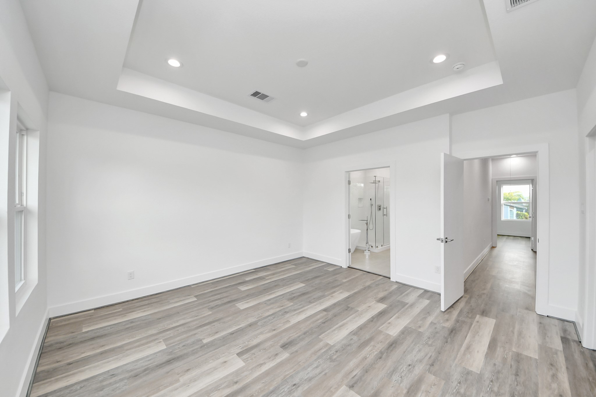 Primary bedroom (Sample photo from same floor plan next to the address)