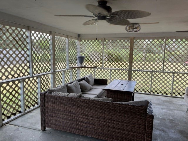 The patio provides a great view of the large backyard and another building that has a workshop and 2 rooms with window units for crafting or hobbies.