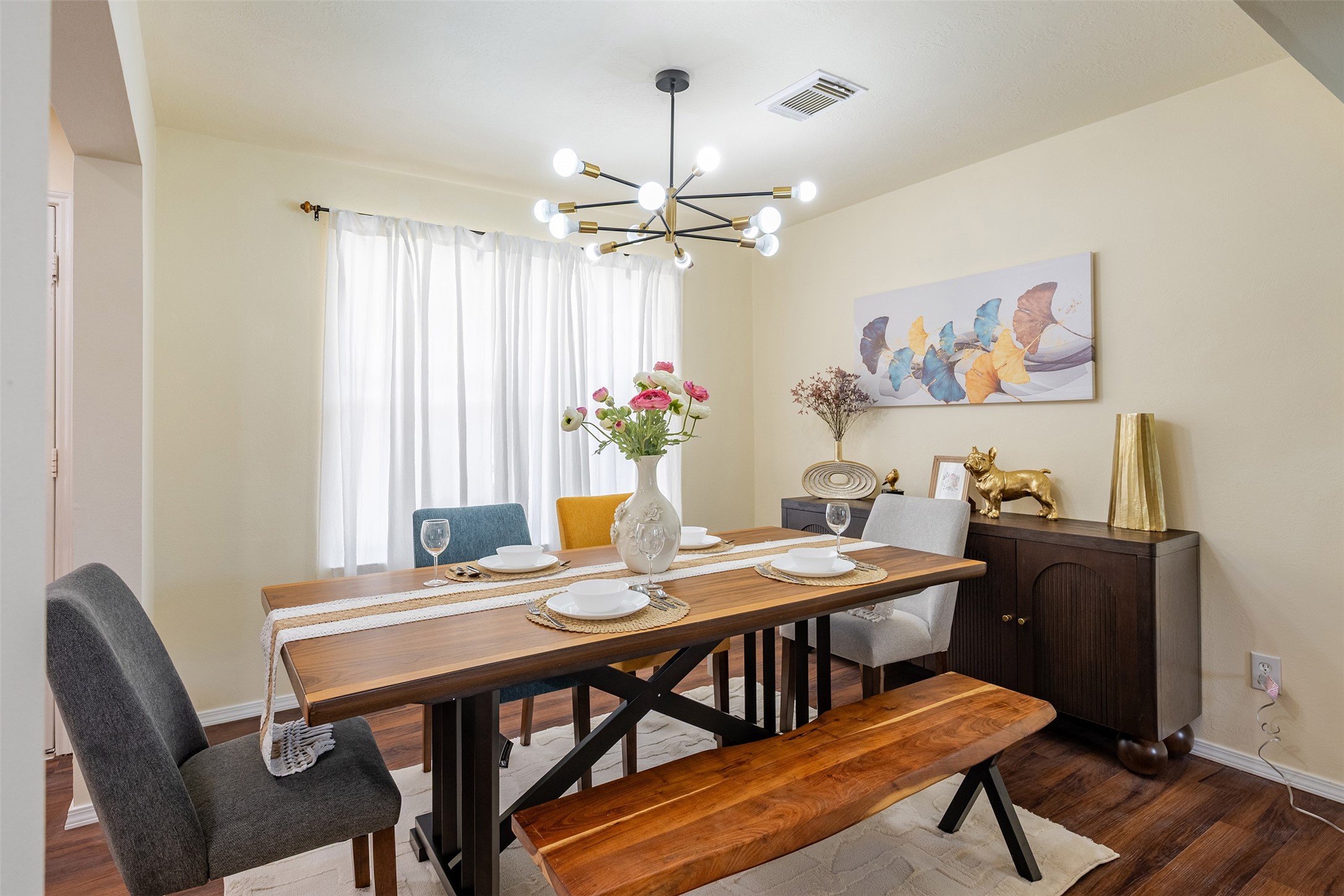 Dining Room: Elegant formal dining room ready for hosting dinner parties and holiday gatherings