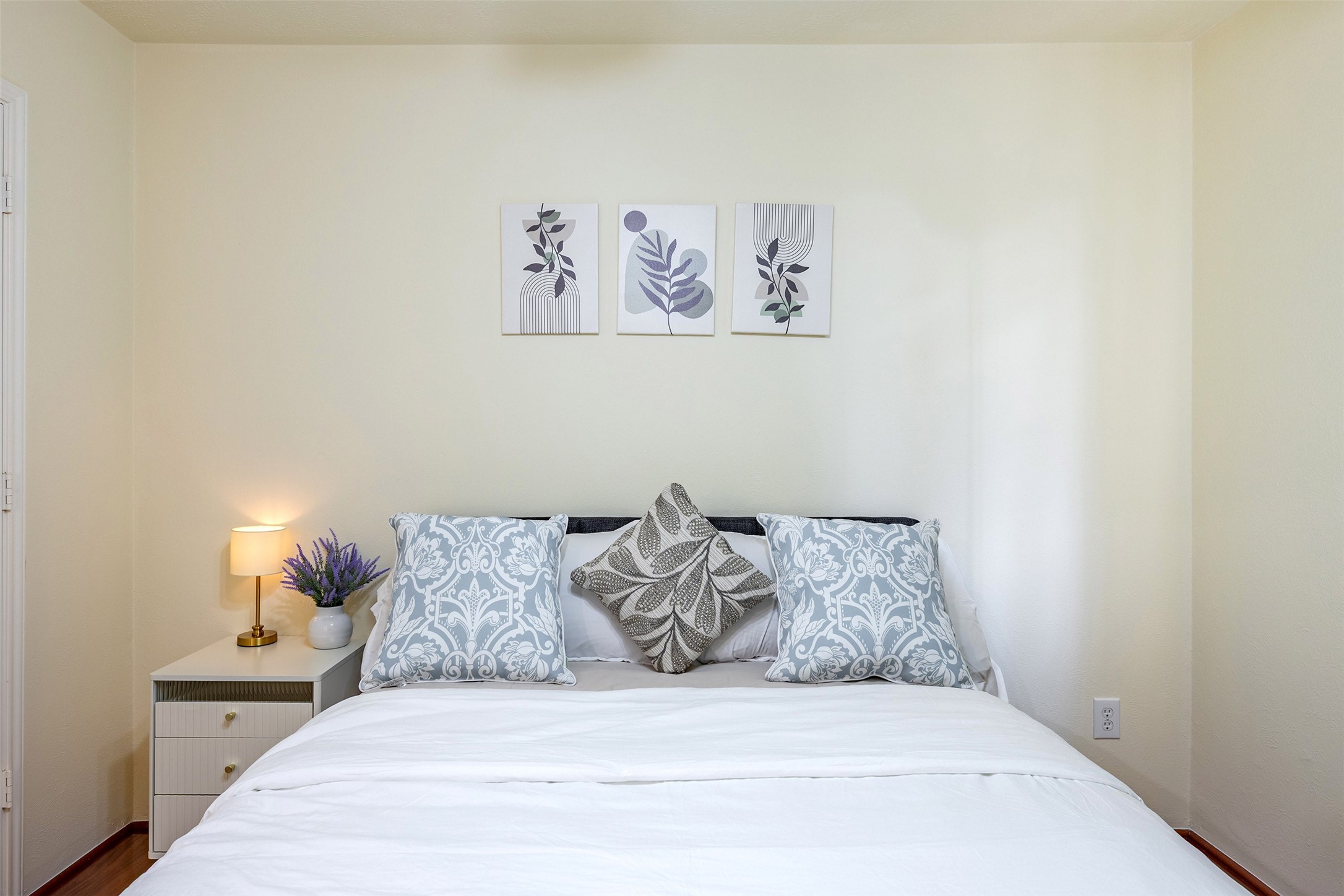 Bedroom 2: Comfortable secondary bedroom with great lighting and flexible use as a guest room or home office.