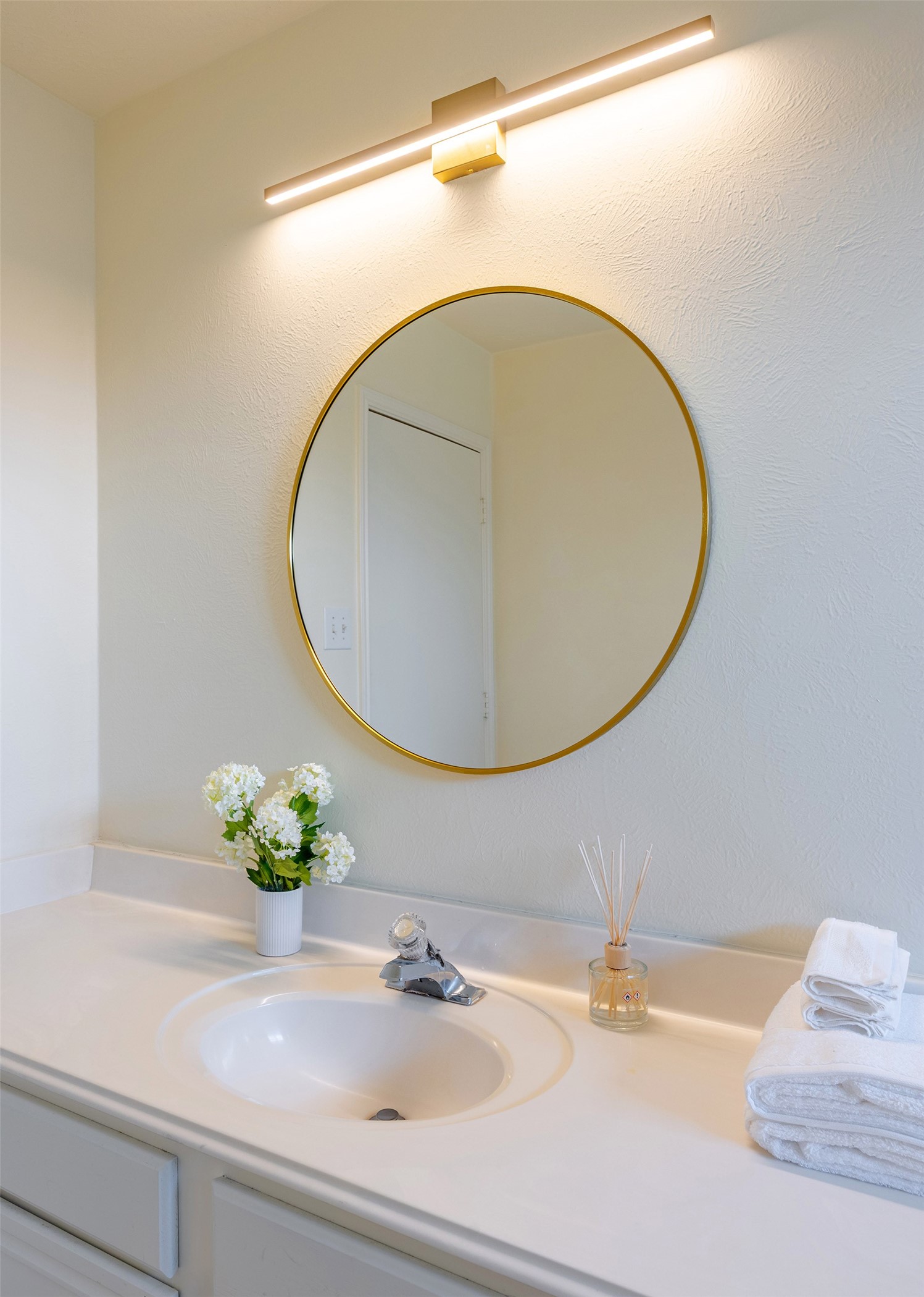 Primary Bathroom: Luxurious primary ensuite bathroom featuring dual vanities, and a soaking tub