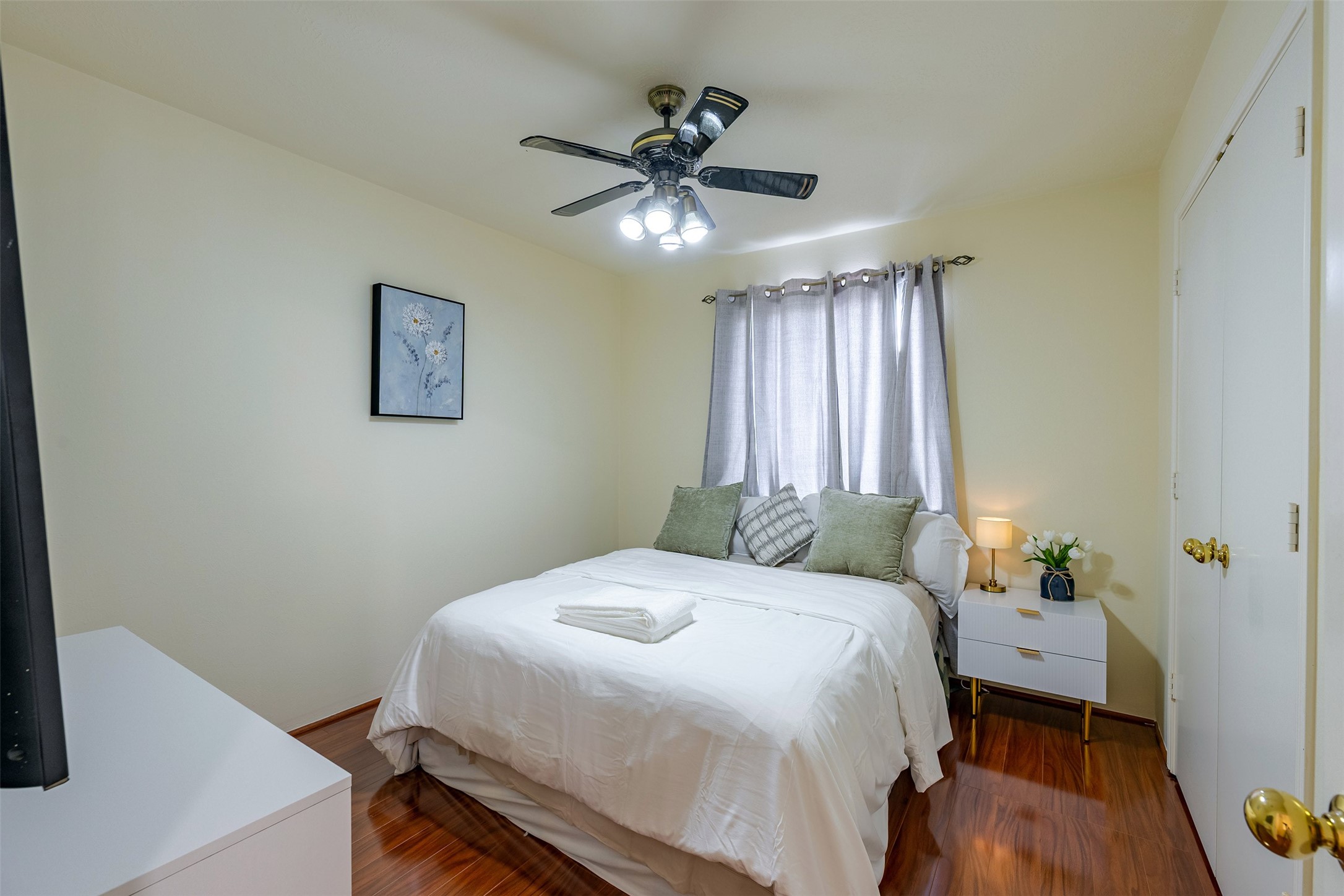Bedroom 3: Comfortable secondary bedroom with great lighting and flexible use as a guest room or home office.