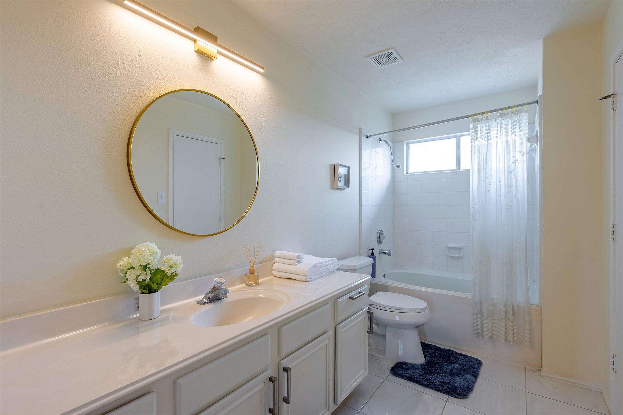 Primary Bathroom: Luxurious primary ensuite bathroom featuring dual vanities, and a soaking tub
