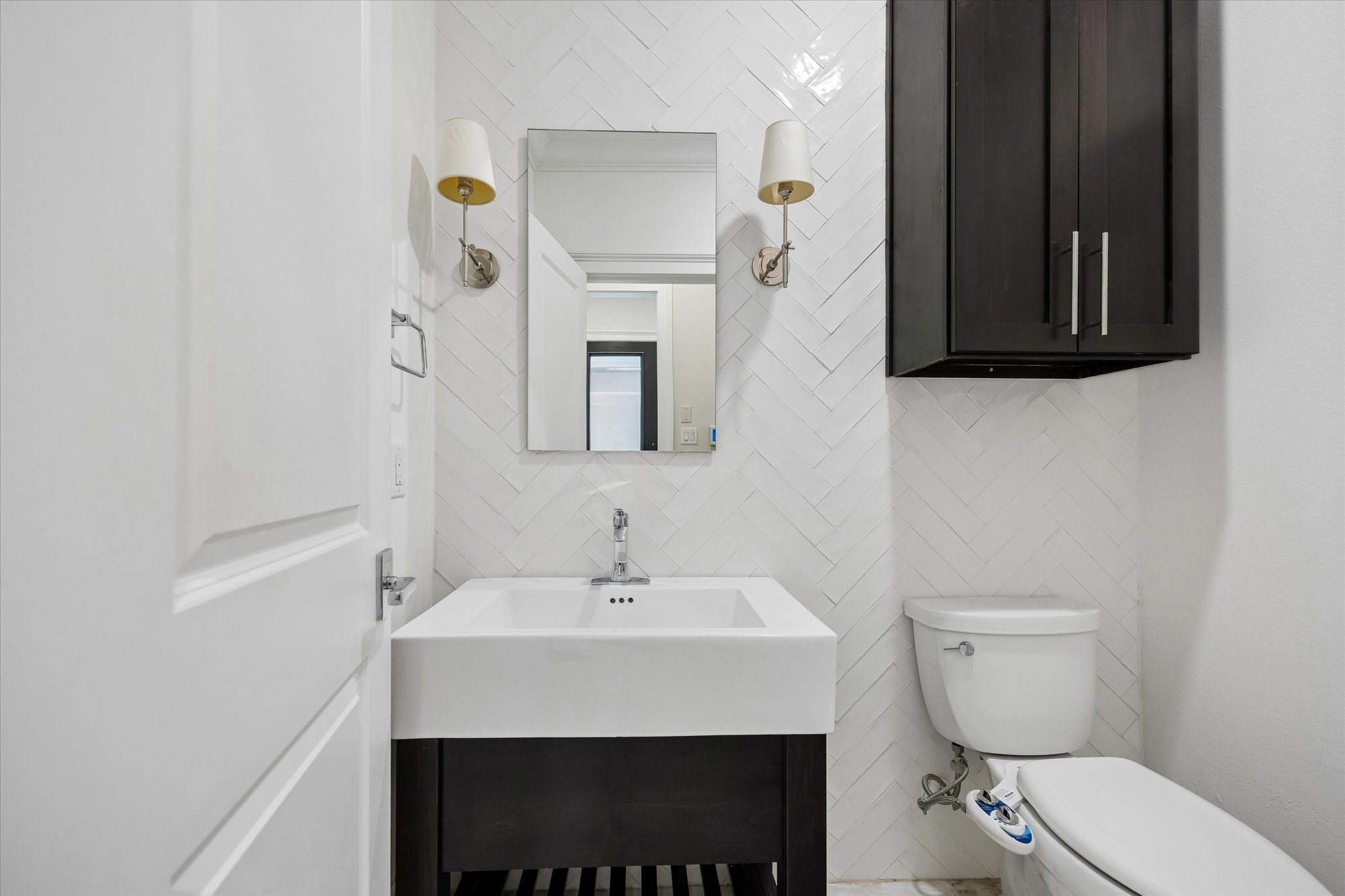Powder bath conveniently located on the first floor.