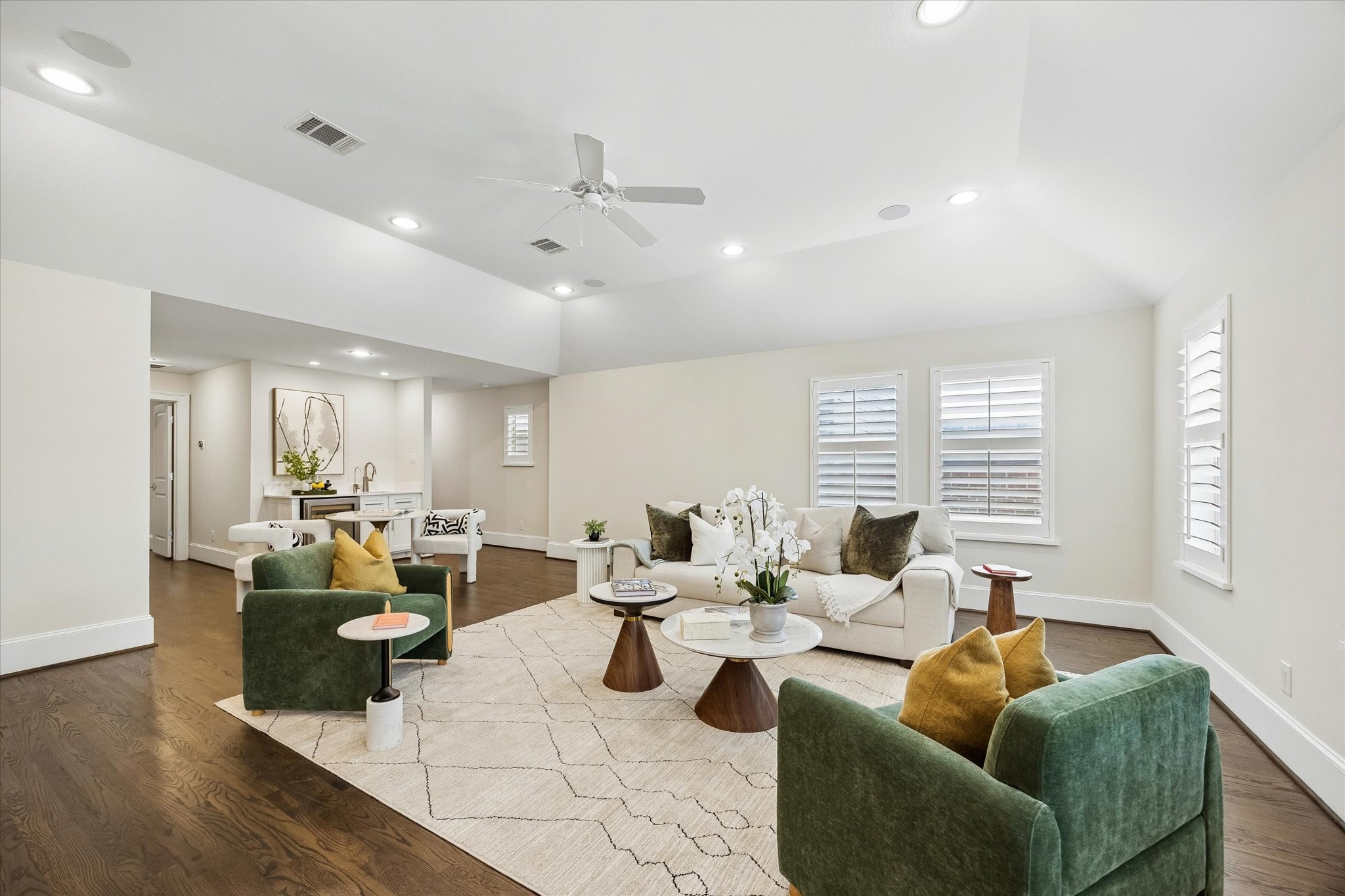 Entertaining is effortless in the large game room, complete with a wet bar and beverage fridge.