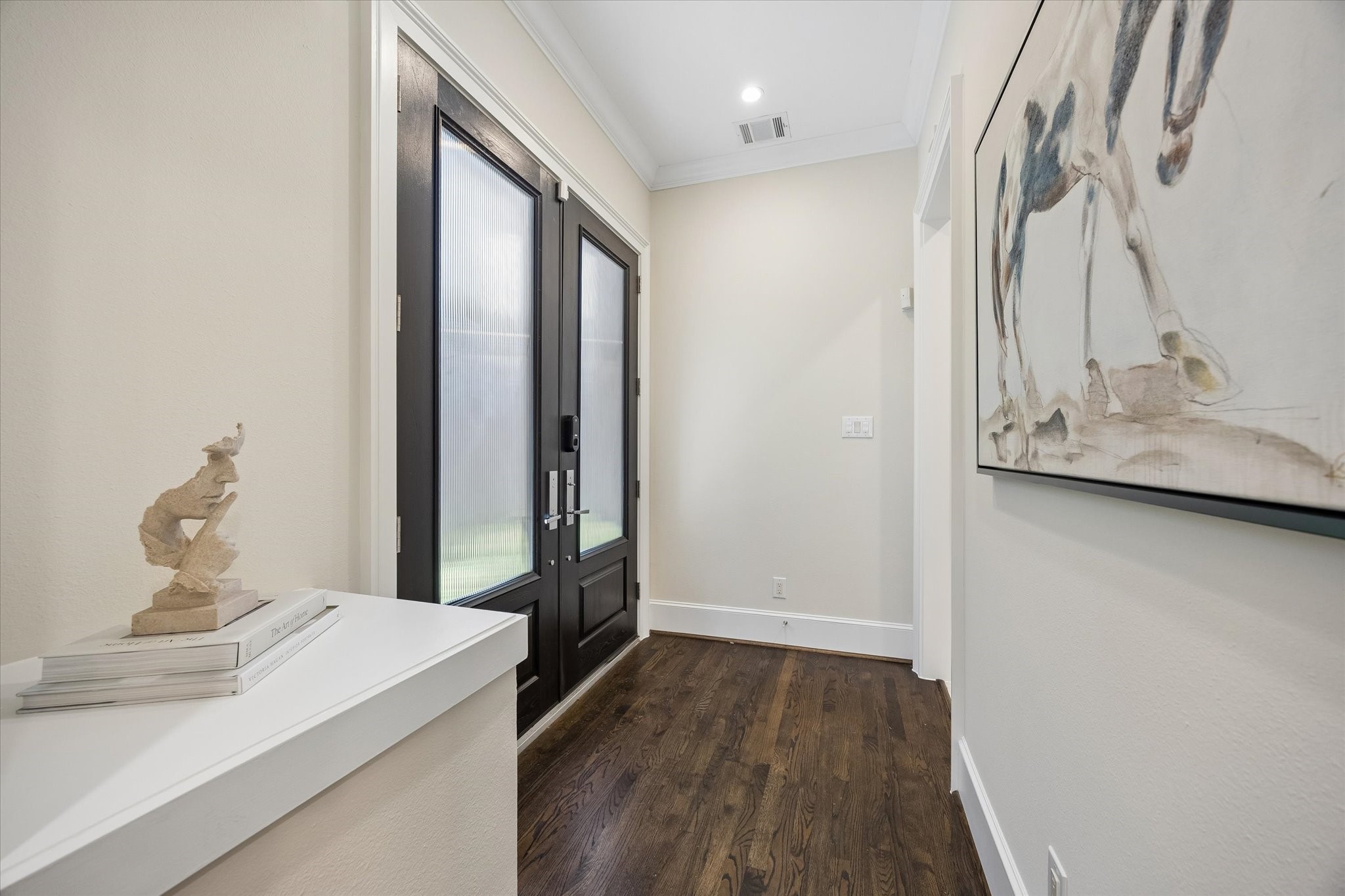 From the moment you enter, soaring ceilings and gorgeous hardwood floors create a stunning first impression and flow seamlessly throughout the home.