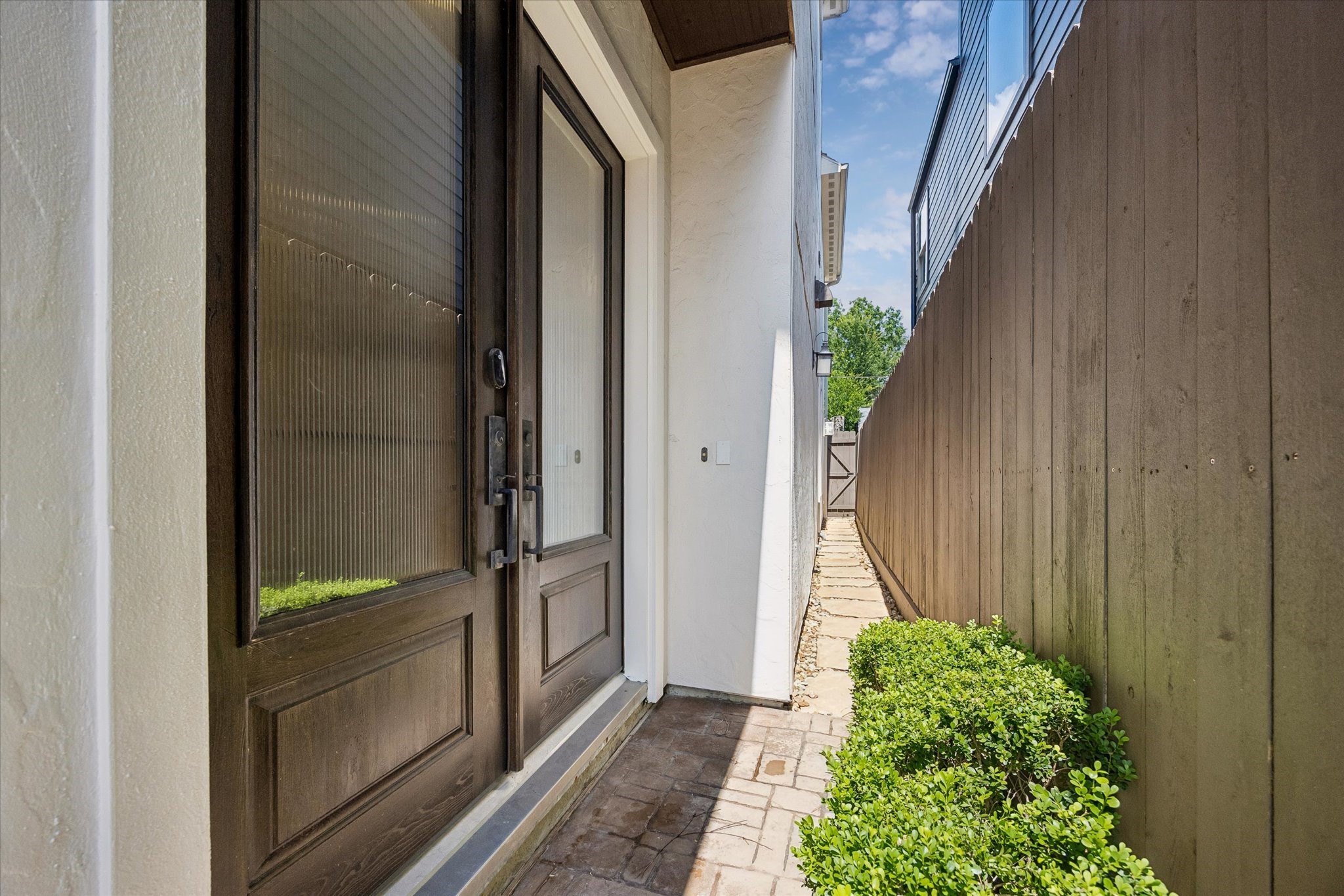 Thoughtful upgrades of the home include epoxy garage floors, wood shutters and sprawling closets throughout.