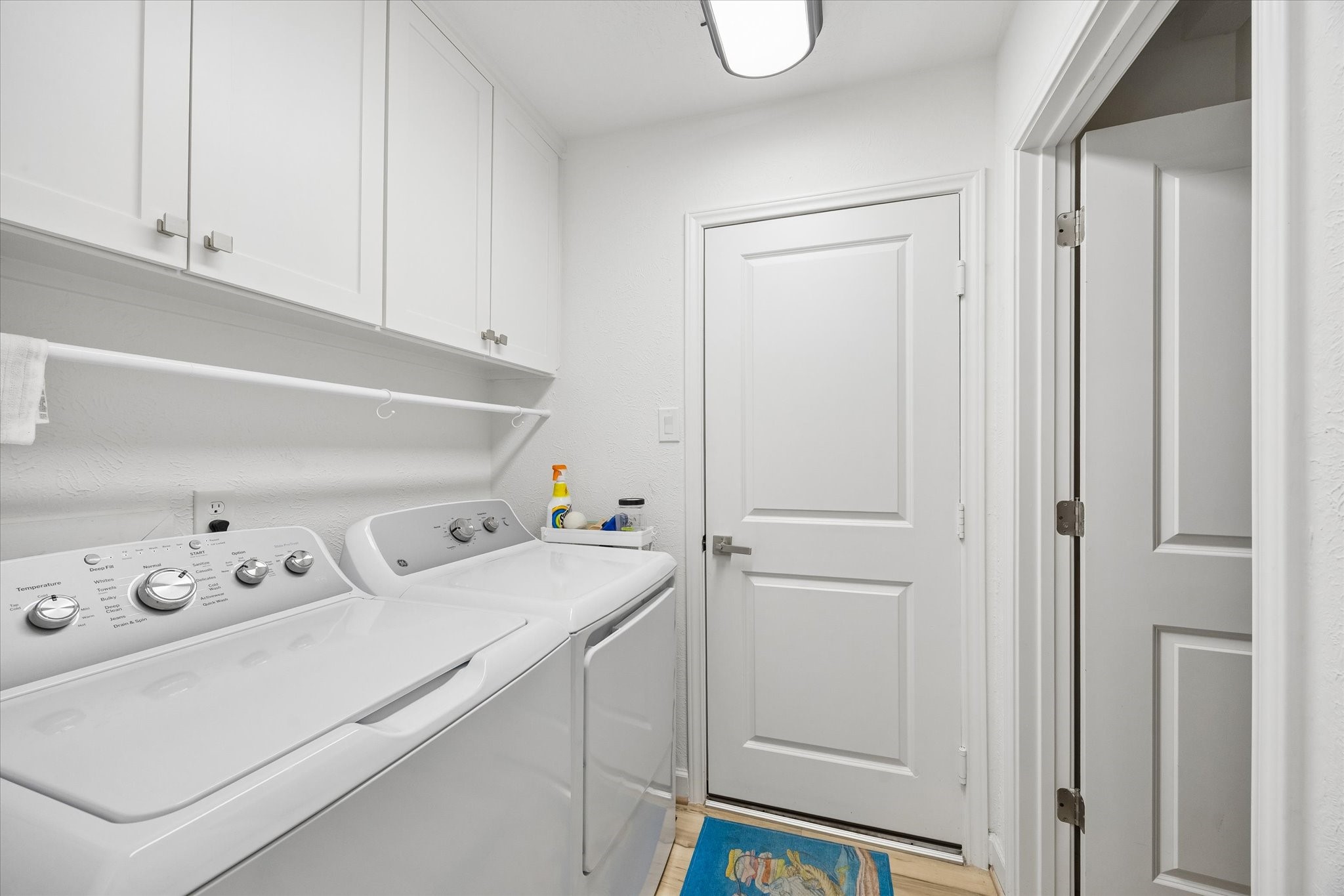 Spacious utility room is just off the kitchen & boasts huge walk-in pantry!