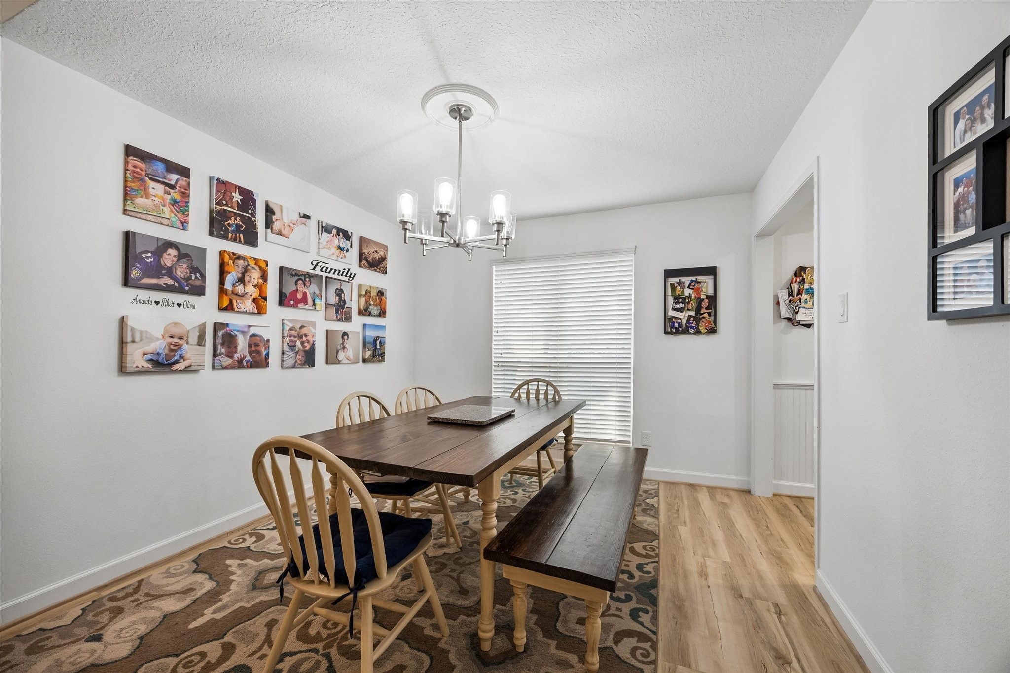 Another view of spacious dining room with large window, recently replaced with high-end dual pane window!