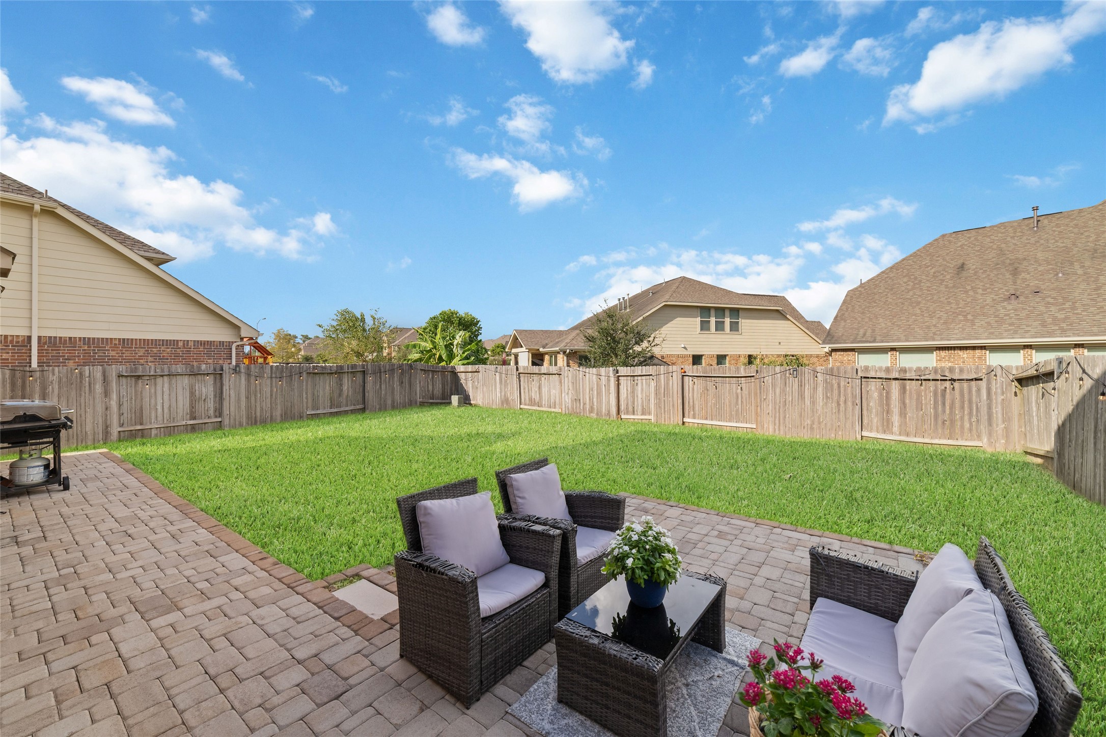 Extended patio area provides plenty of room for entertaining guests.