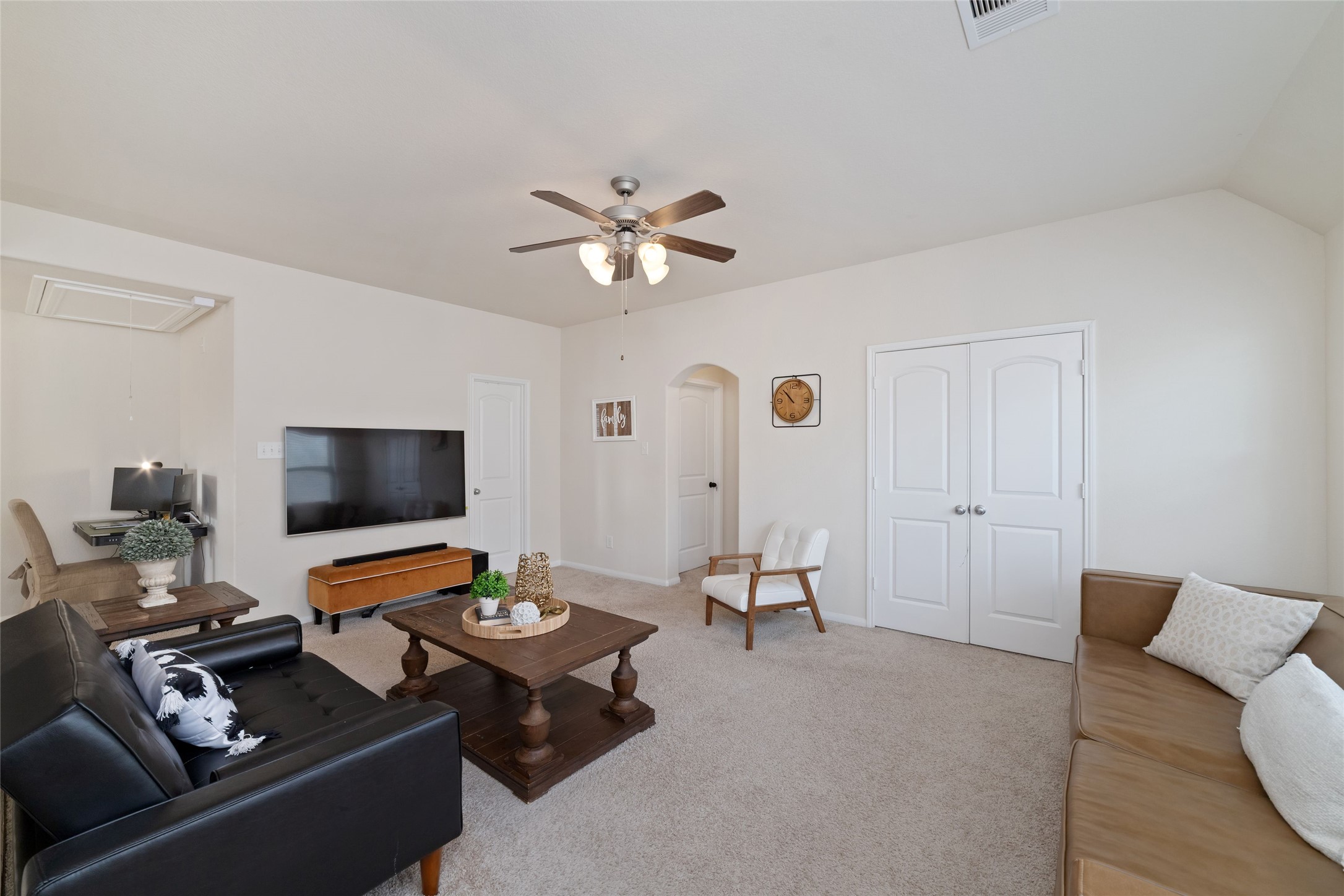 Another view of the spacious game room with endless options.