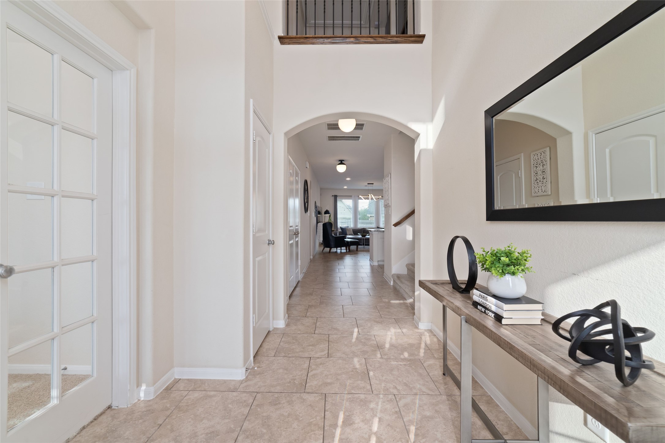 The welcoming front entry opens to tall ceilings and a light & bright interior. The welcoming front entry opens to tall ceilings and a light & bright interior.