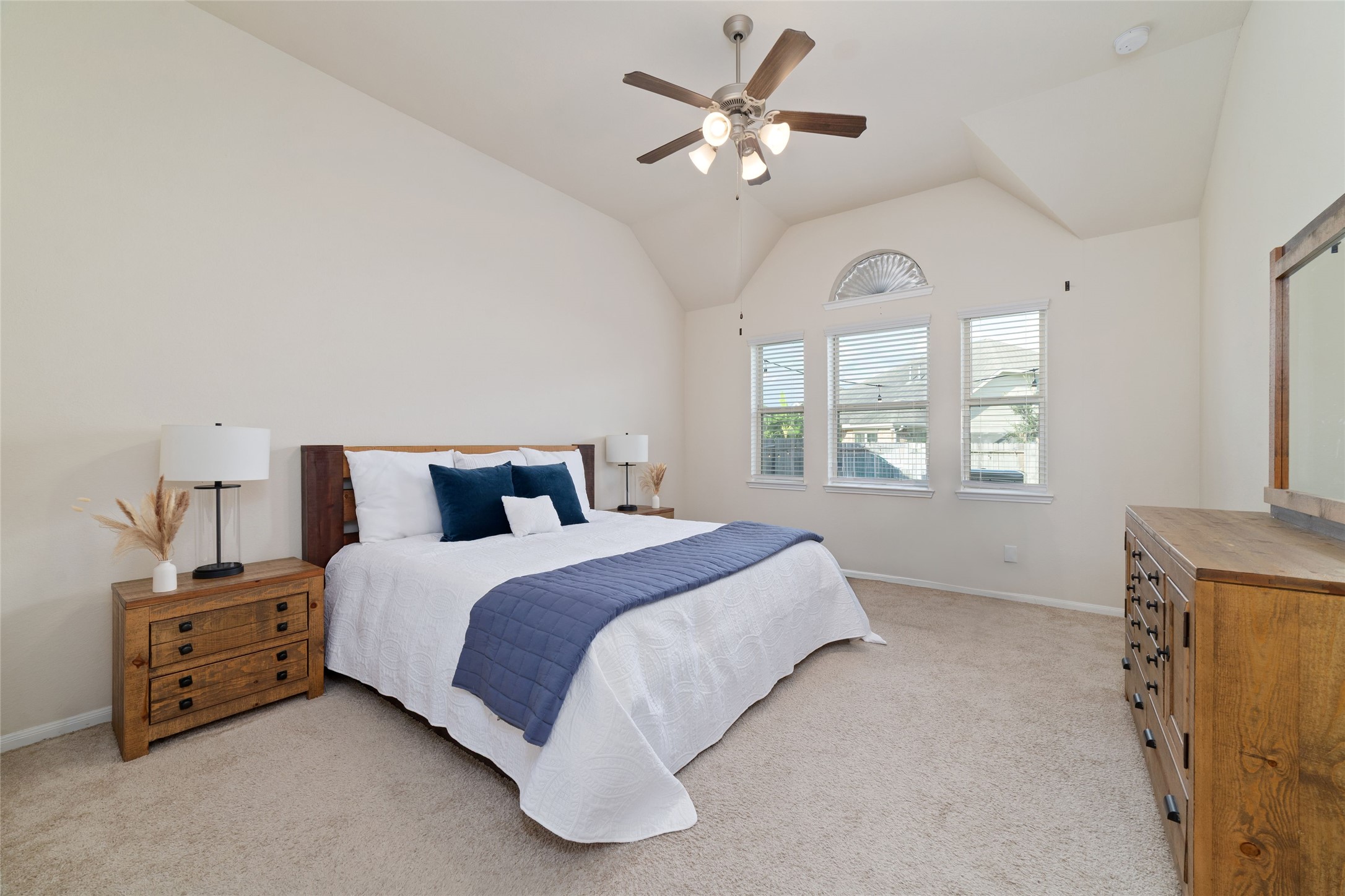 The generously sized primary bedroom offers plenty of room for furniture or a sitting area. The generously sized primary bedroom offers plenty of room for furniture or a sitting area.