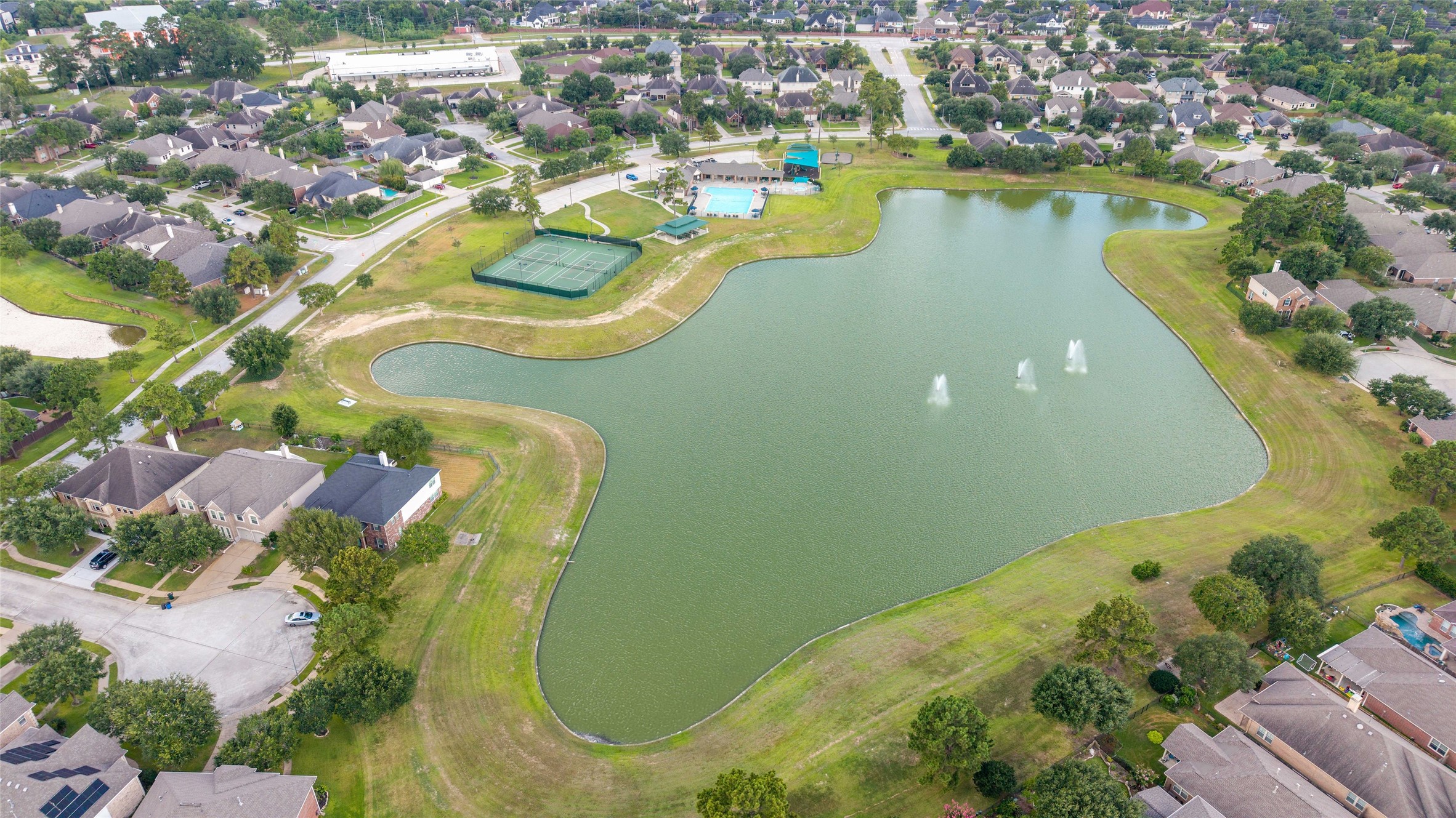 Another view of the community amenities - tennis courts, pavilion, swimming pool and playground.