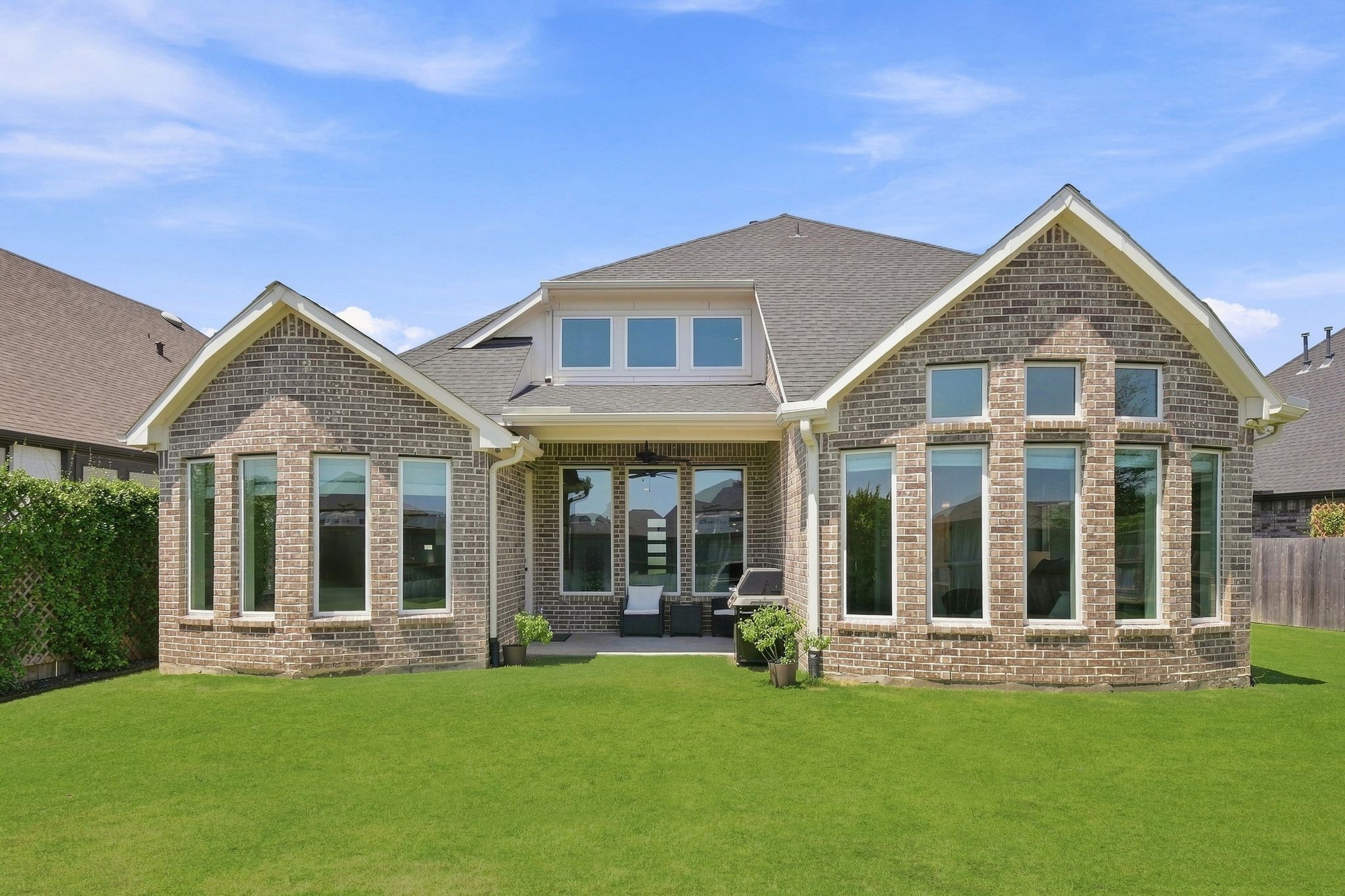 Covered patio perfect for relaxing or grilling!
