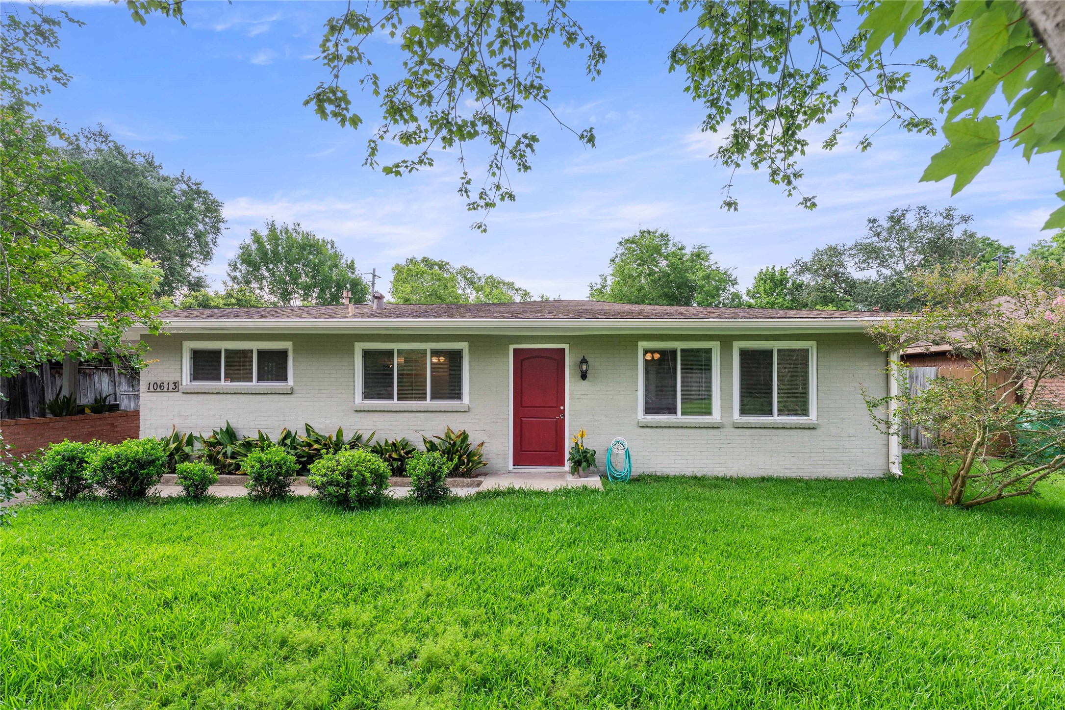 Welcome to 10613 Willowgrove, a mid-century modern home filled with style and charm!  Updated DOUBLE-PANED energy efficient windows run throughout the house.