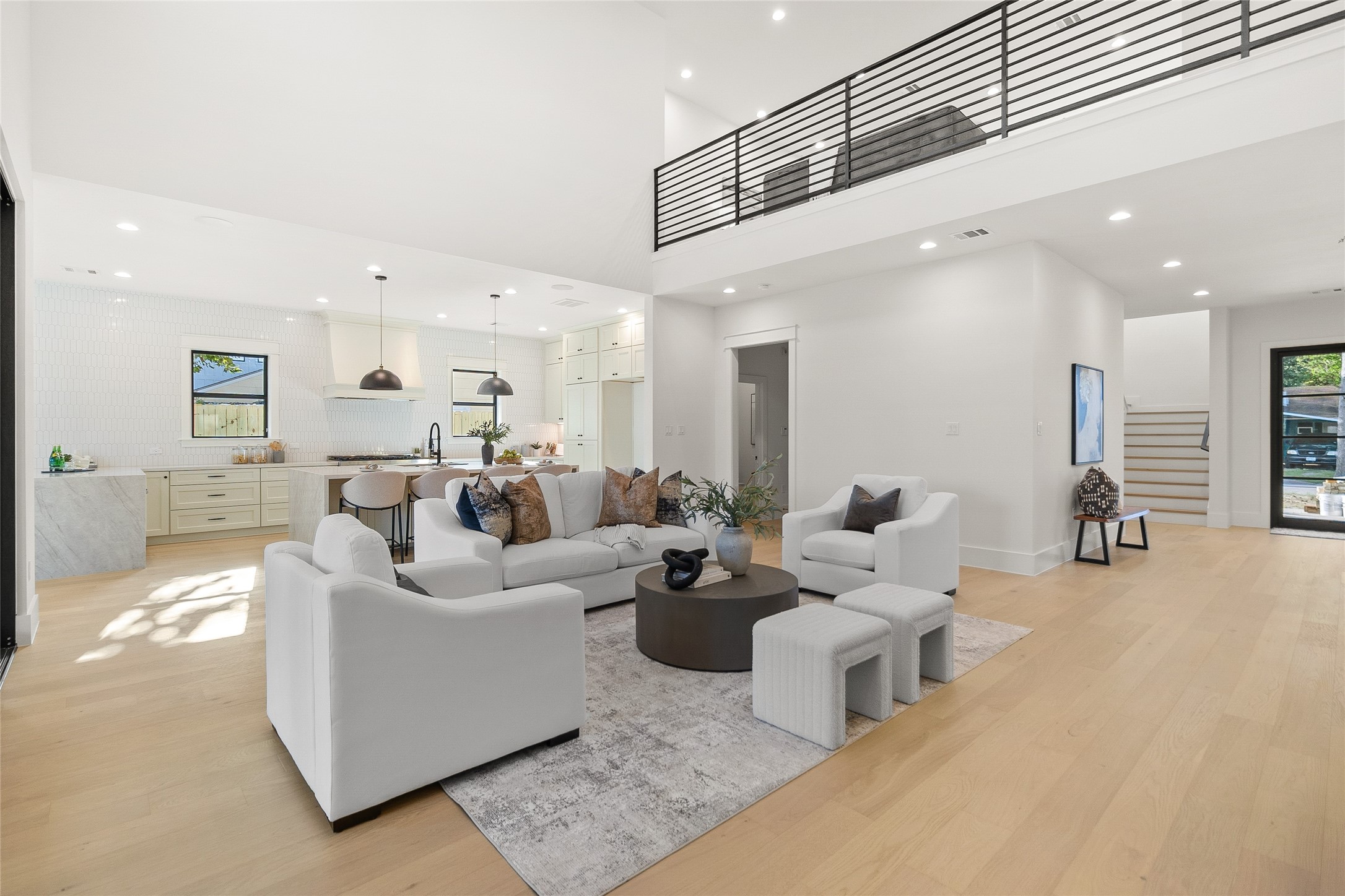 Everyday life flows effortlessly through this bright, open-concept layout where the living room, kitchen, and dining spaces are all connected. Everyday life flows effortlessly through this bright, open-concept layout where the living room, kitchen, and dining spaces are all connected.