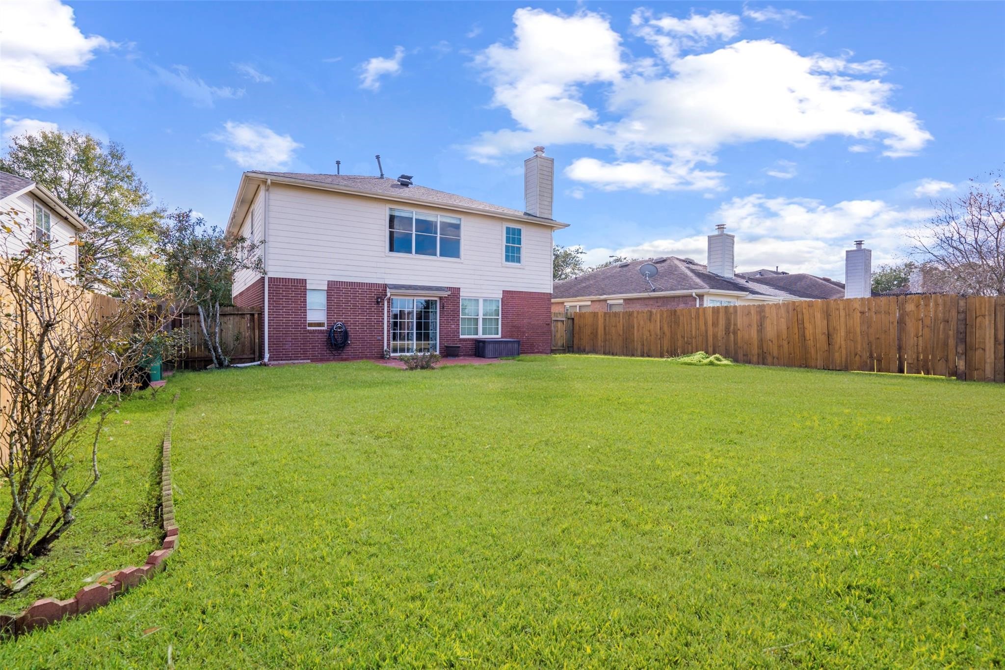 They yard is incredibly large with plenty of green space for afternoon fun! *grass virtually staged They yard is incredibly large with plenty of green space for afternoon fun! *grass virtually staged
