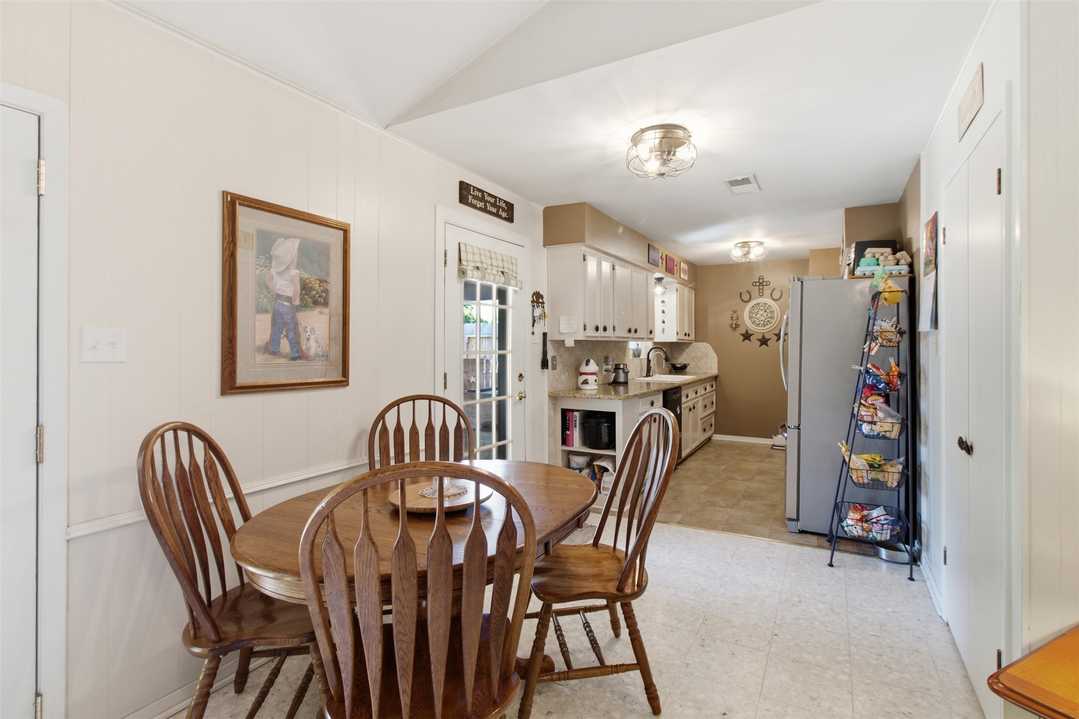Dining leading into kitchen Dining leading into kitchen