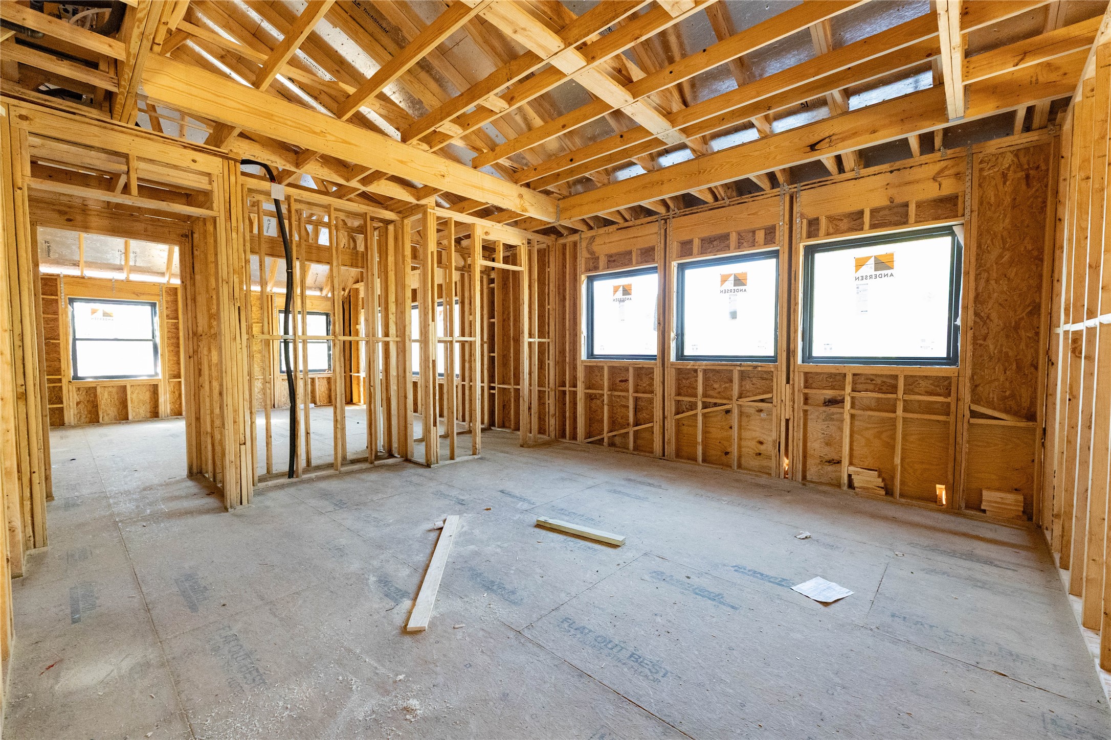 2nd Floor Game Room is pre-wired for audio and offers 3 large Andersen windows to let natural light in.  Construction Photo taken 10/22/26