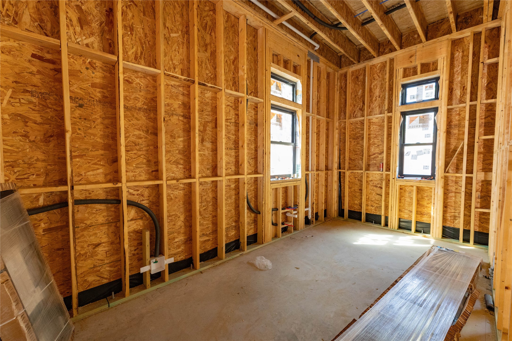 Scullery is located directly behind the kitchen w/ 2nd Fridge & dishwasher. Additional custom site-built cabinetry & quartz counter space for appliances, along w/ more storage space. Construction Photo taken 10/22/26