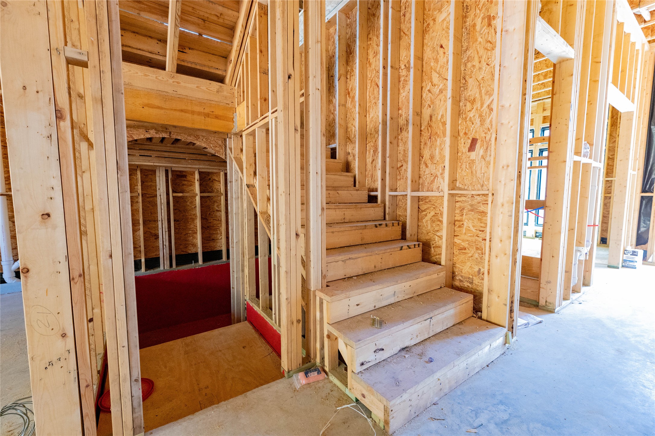 Below ground temp-controlled wine room right outside the Front entry & Family Room. Construction Site photo taken 10/22/26.
