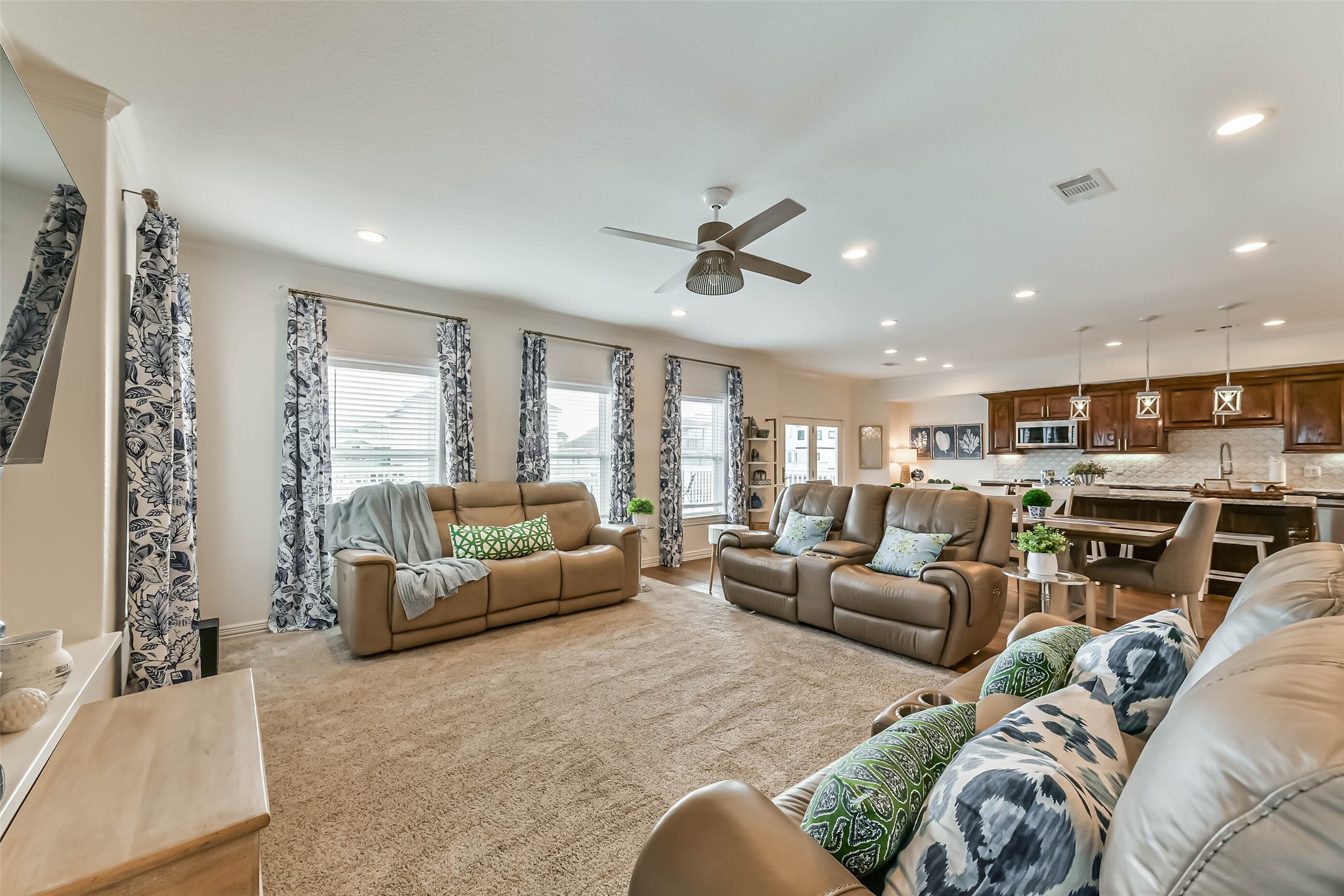 Soaring ceilings and expansive windows frame incredible waterfront views.