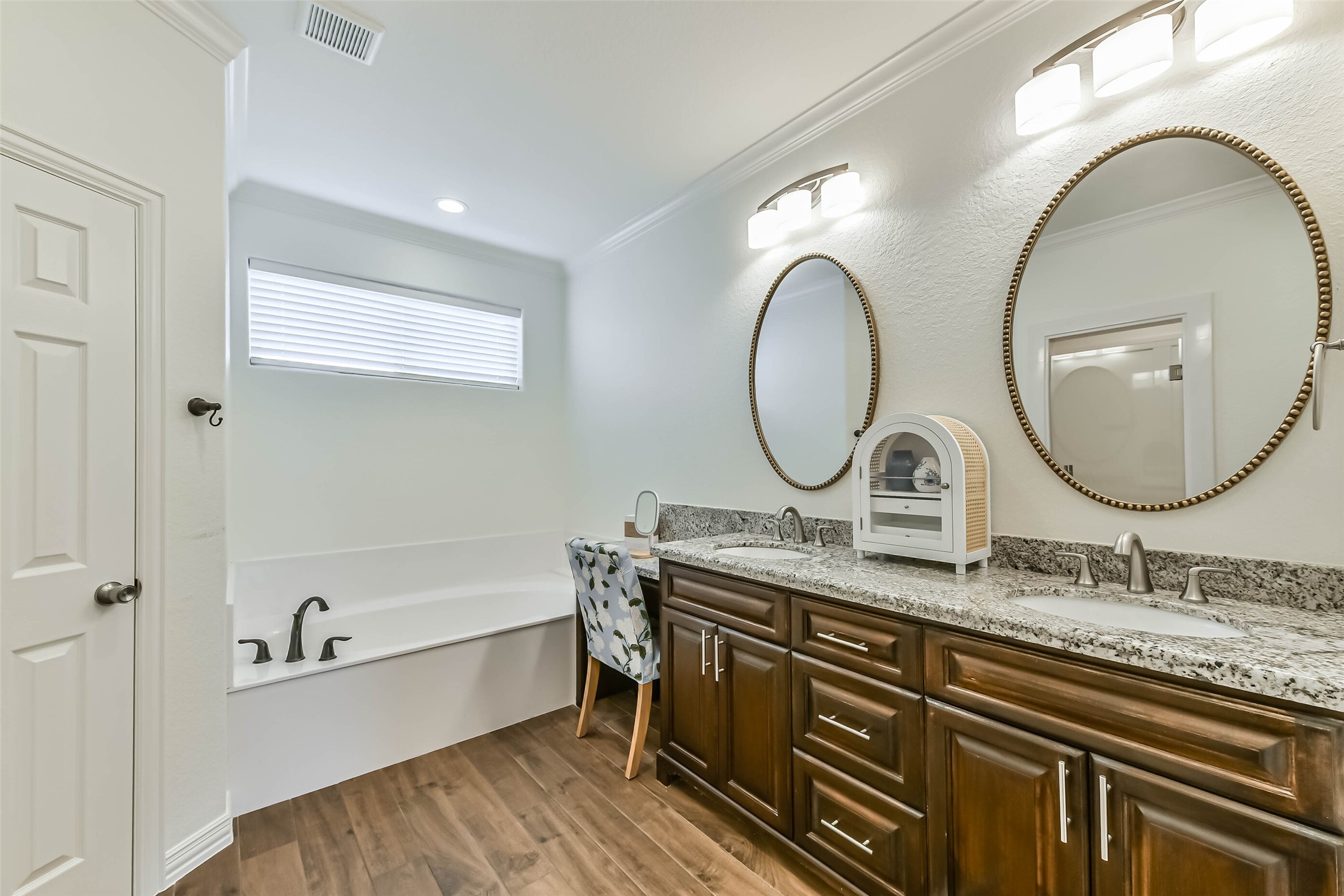 Spa-inspired primary bath offering comfort and privacy.