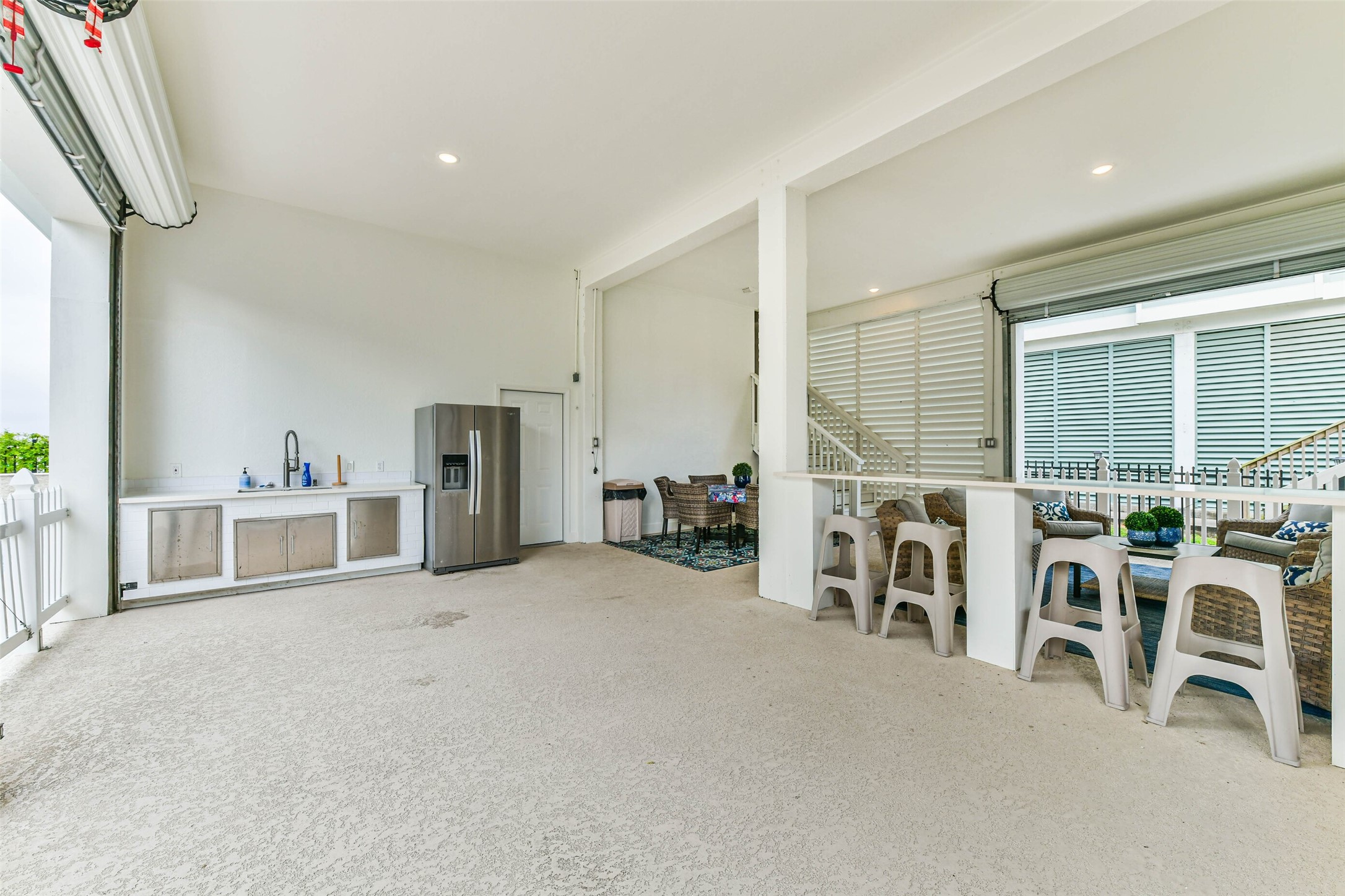 Oversized ice maker provides added convenience for boating, fishing, and hosting guests, enhancing the homes turnkey coastal lifestyle appeal.