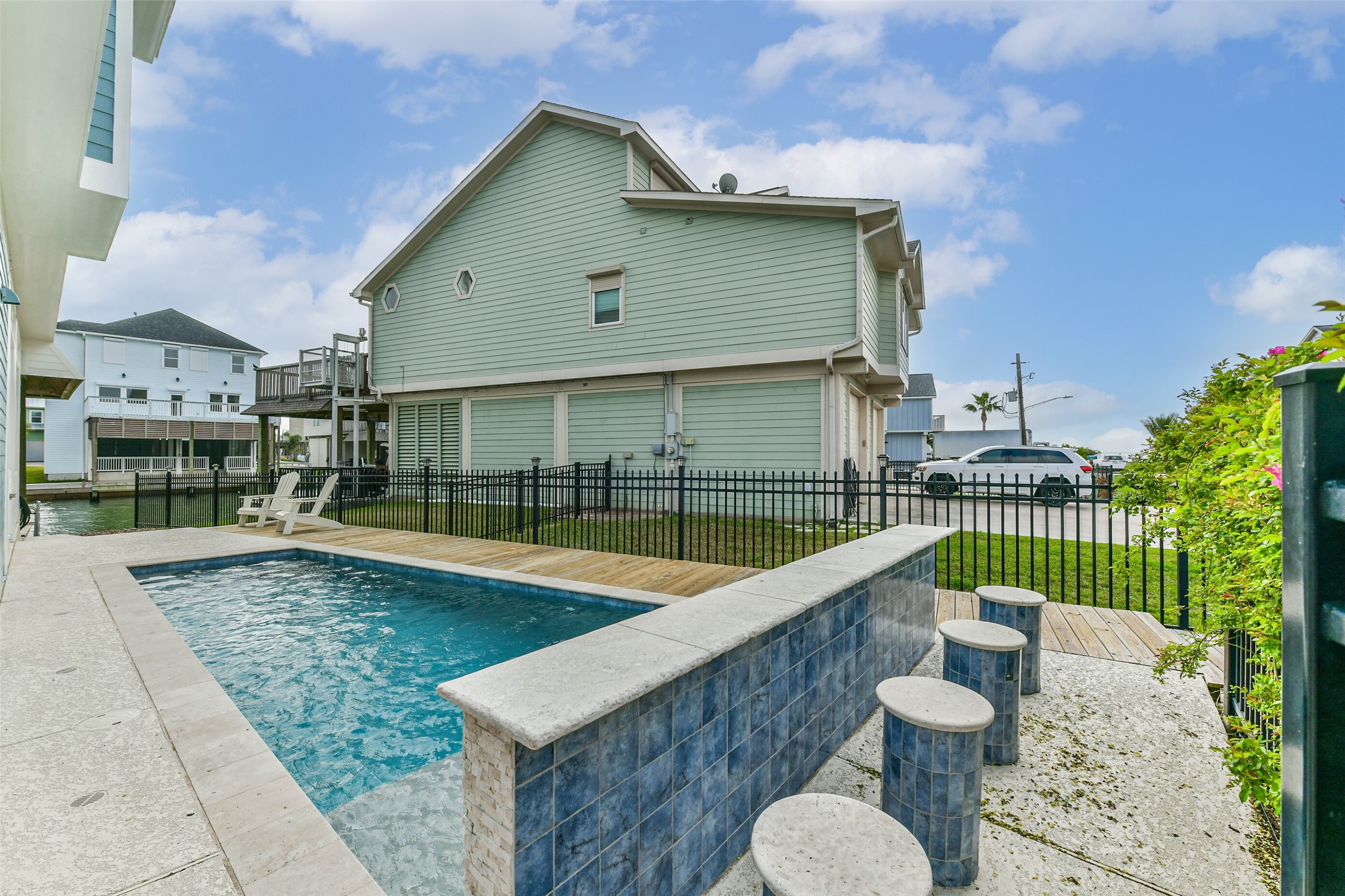 Thoughtfully designed pool space positioned for privacy and relaxation, blending recreation, entertaining, and coastal lifestyle living.