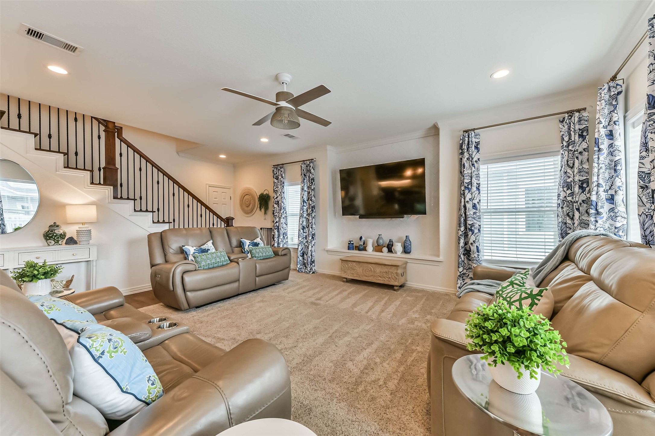 Natural light fills the open living area, creating an inviting space to relax and entertain.