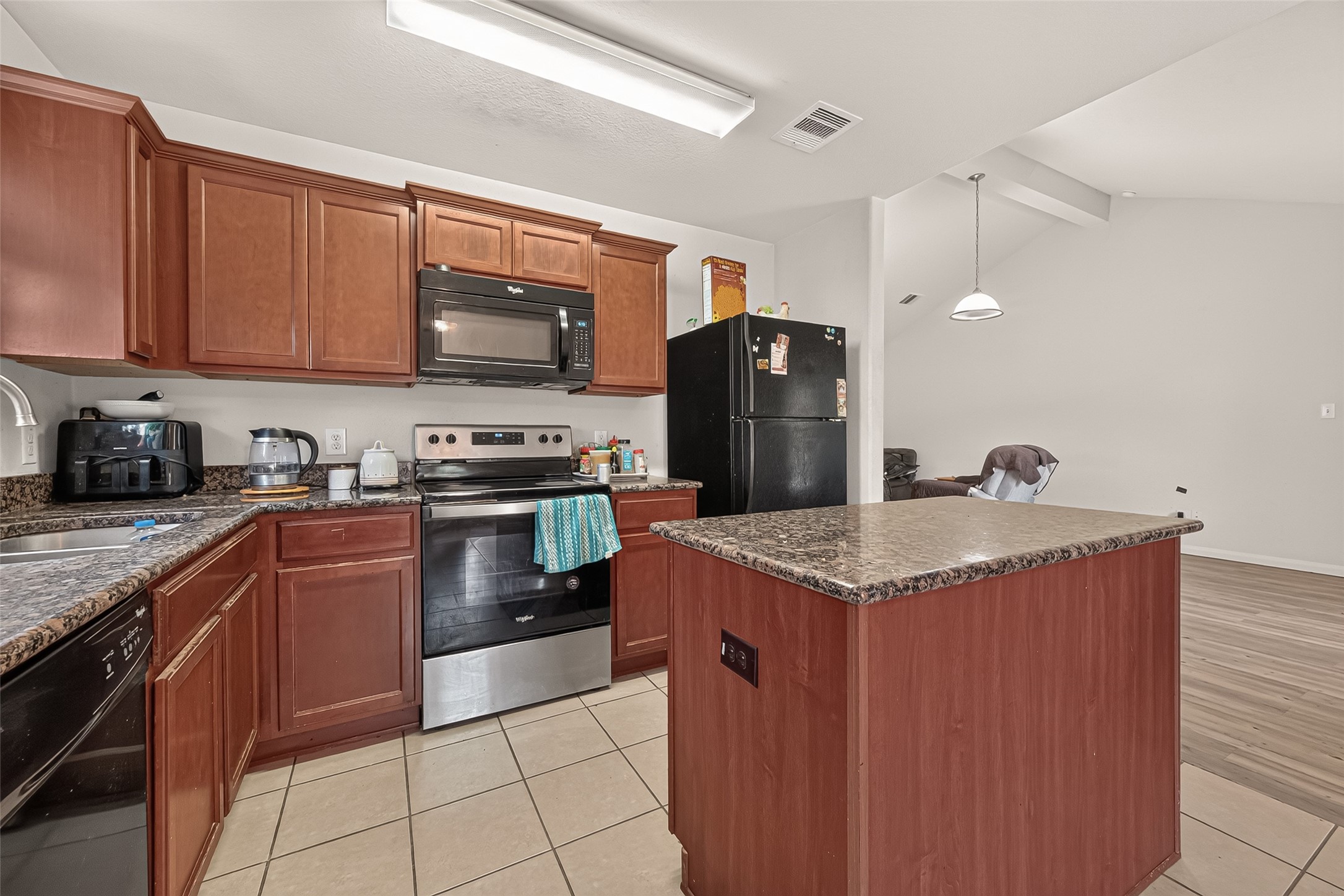 Kitchen w/ island.