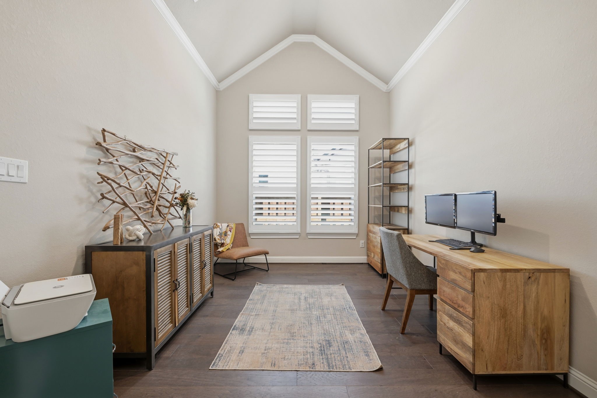 Home Office features vaulted ceilings.