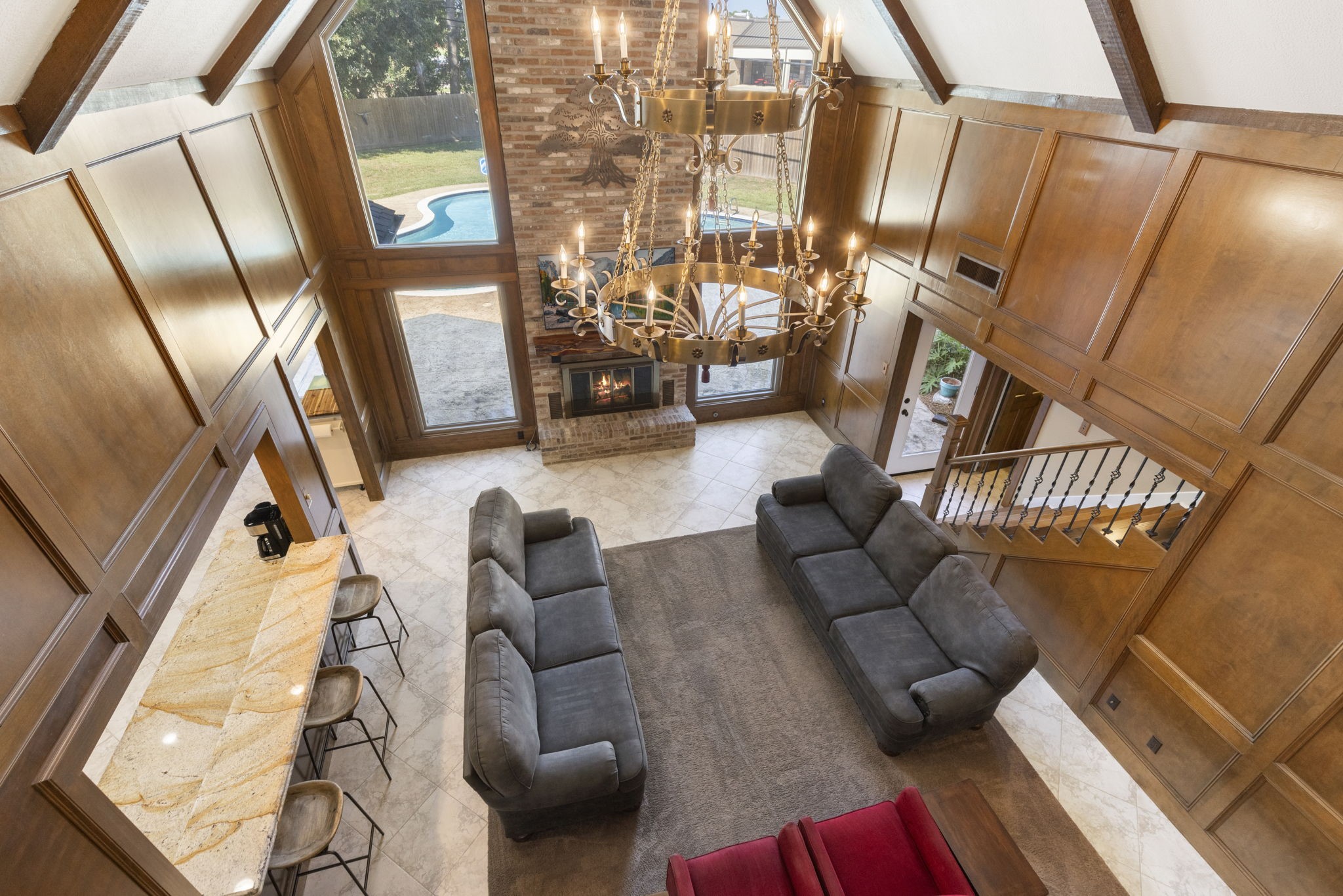 High vaulted ceilings with exposed beams set this room apart.