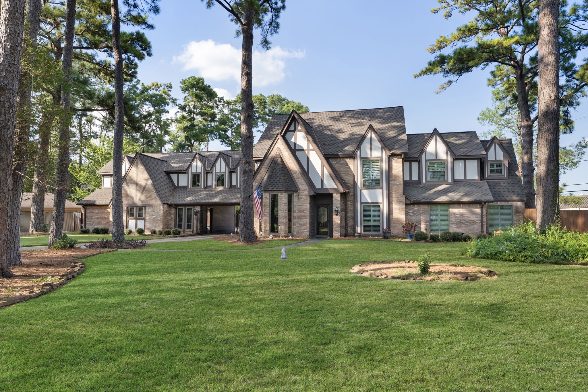 Well manicured walk-way and low mainenance landscaping welcome your friends and family.