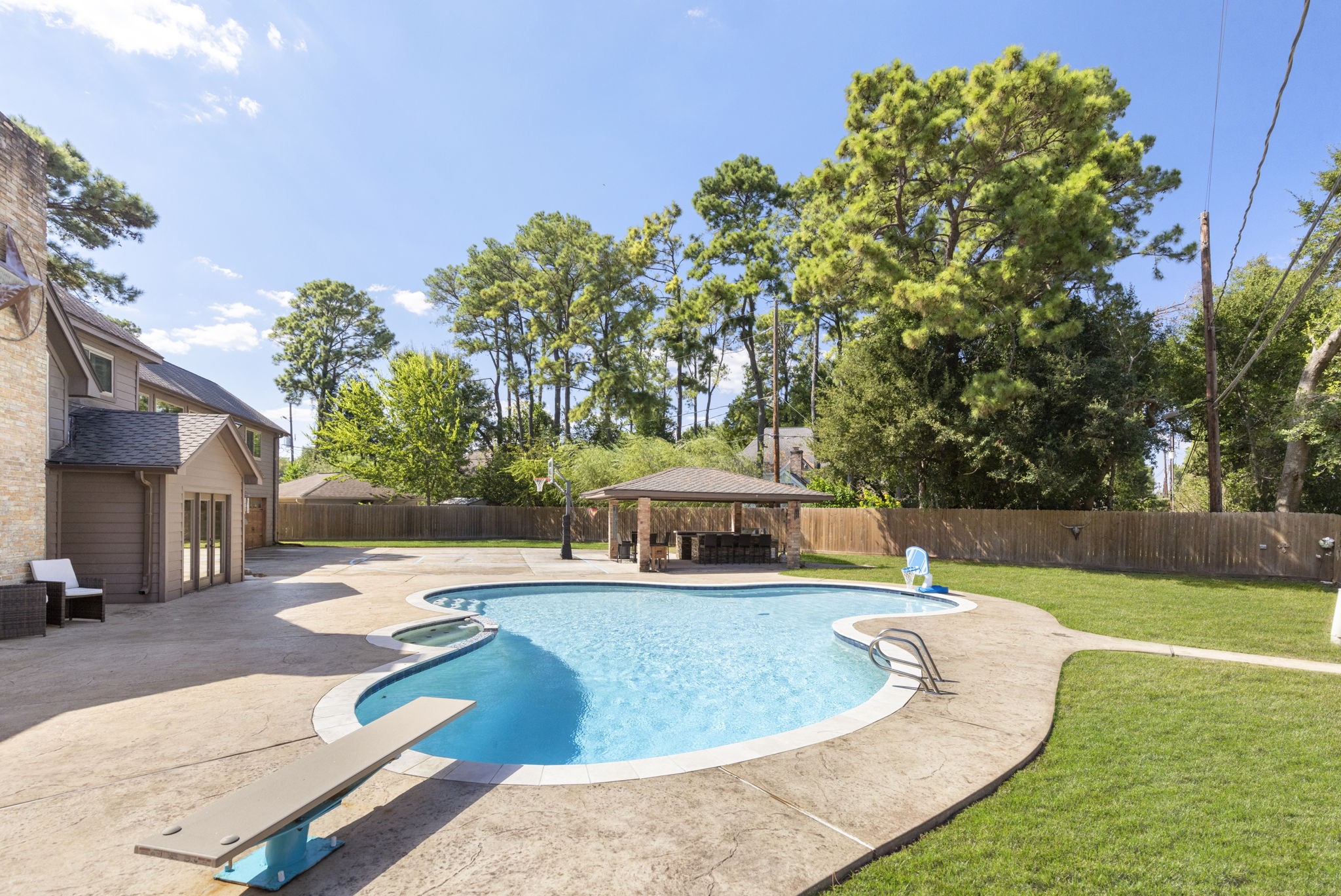 What is not to love about this backyard that was literally designed to provide something for everyone, and all the ages.