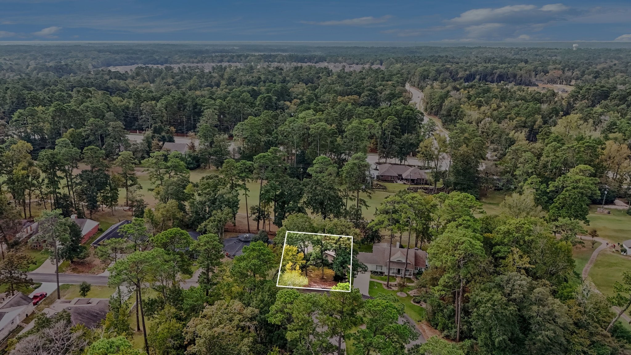 An aerial view of this cozy home in Panorama Village!