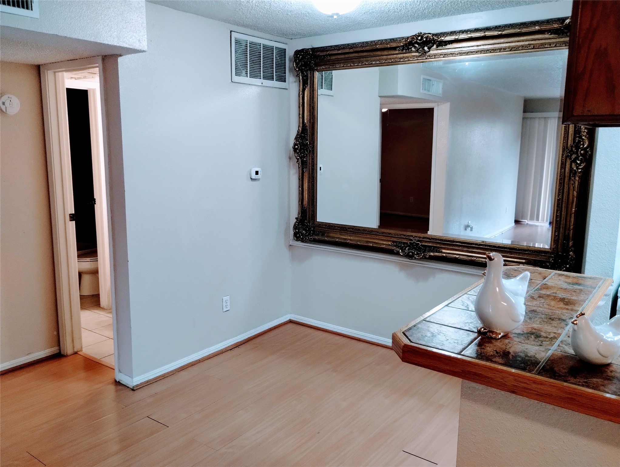 Another view of the DINING ROOM that opens to the KITCHEN and is next to the FULL BATH.