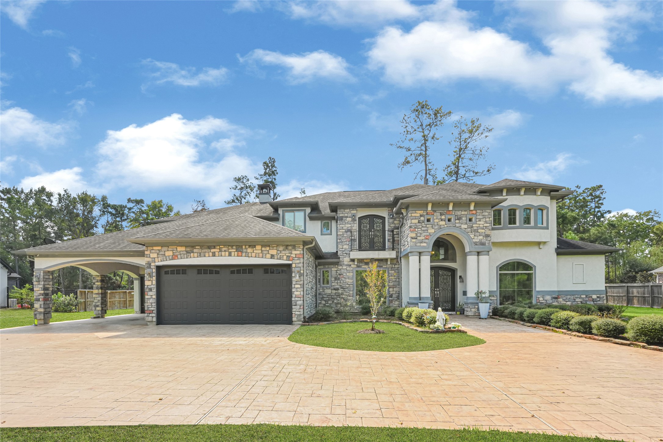 Elegant estate home in Benders Landing Estates with a spacious driveway and impressive curb appeal.