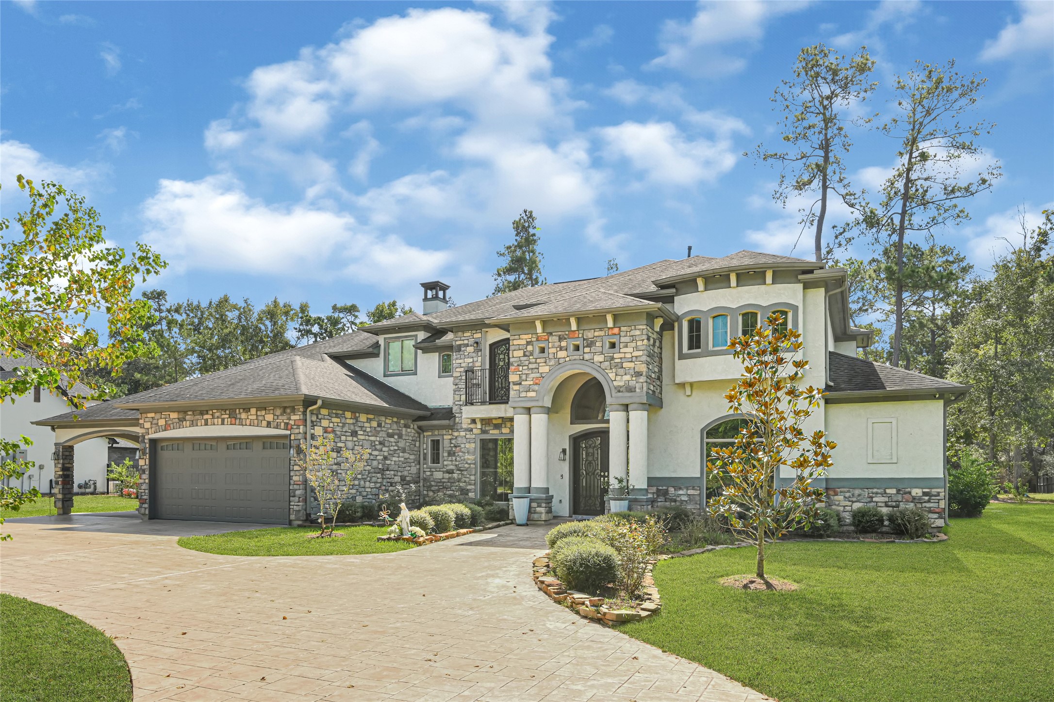 A welcoming front entrance highlights the homes distinctive architectural details.