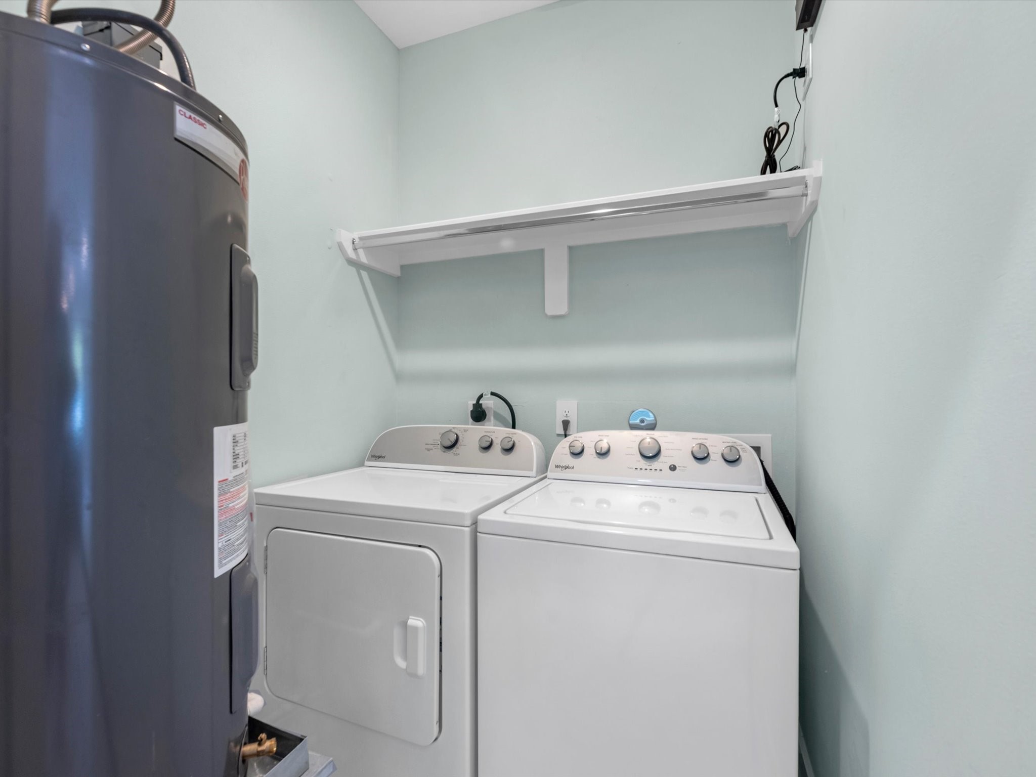 Utility room with new washer and dryer