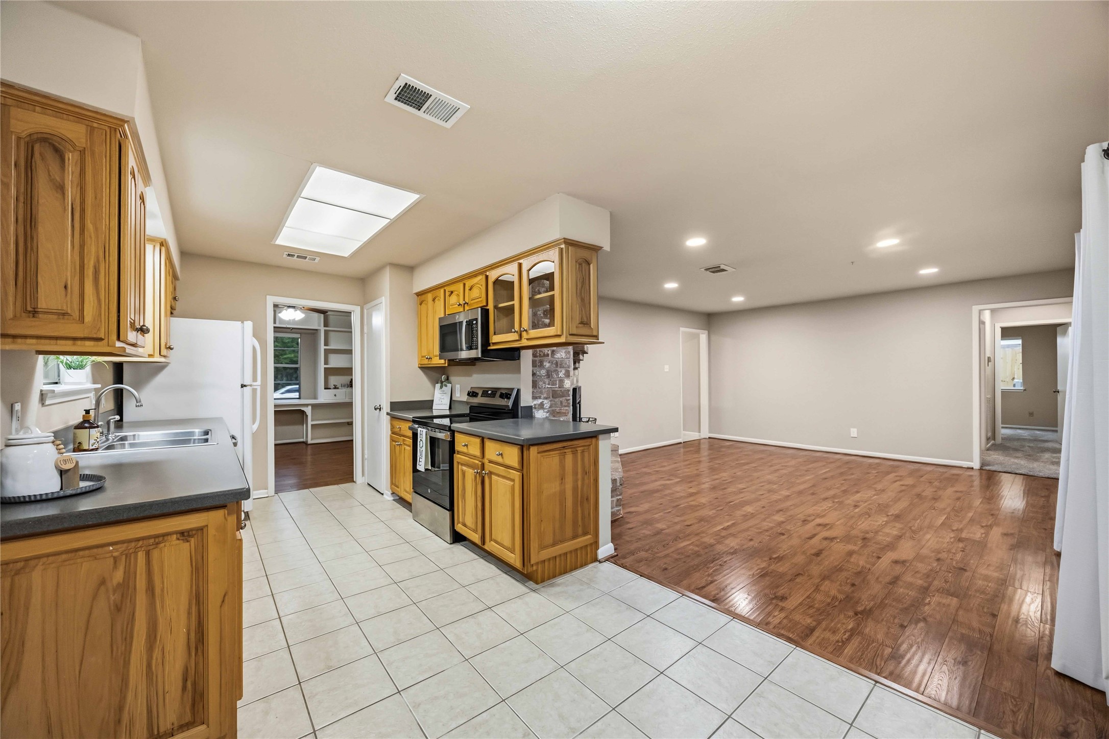 Breakfast Nook to Kitchen/Family Areas