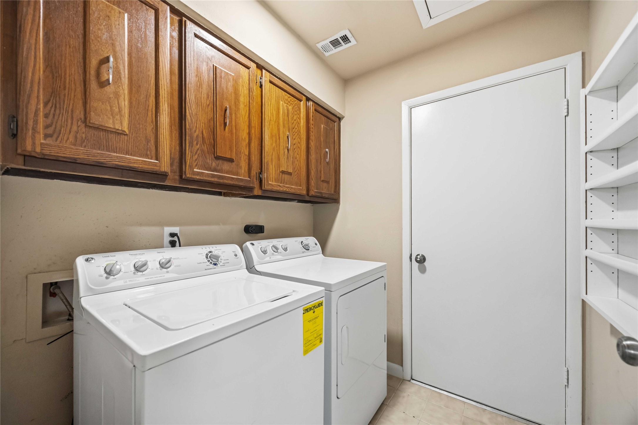 Laundry Room with entry to Garage