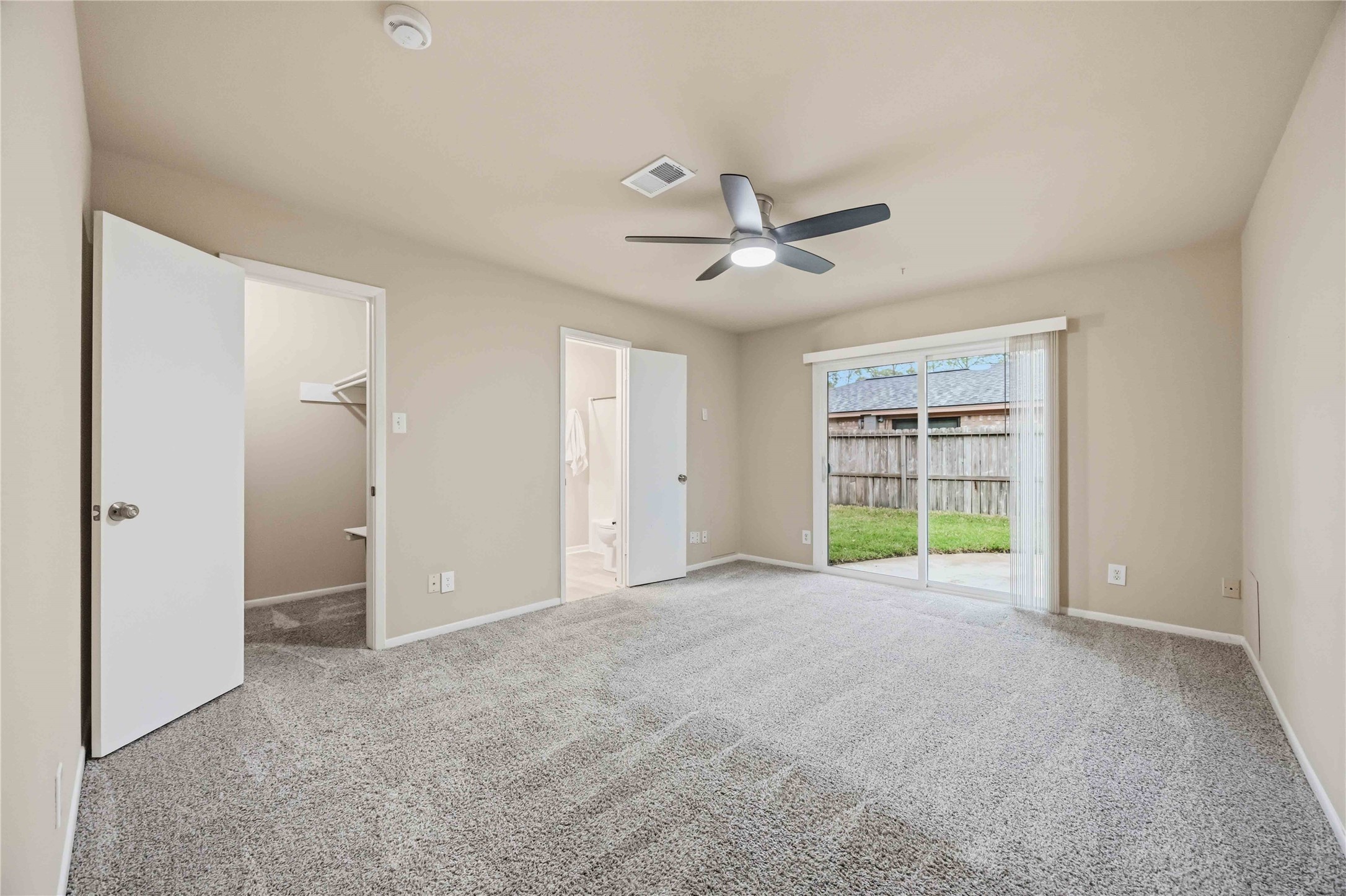 Primary Bedroom with access to Backyard