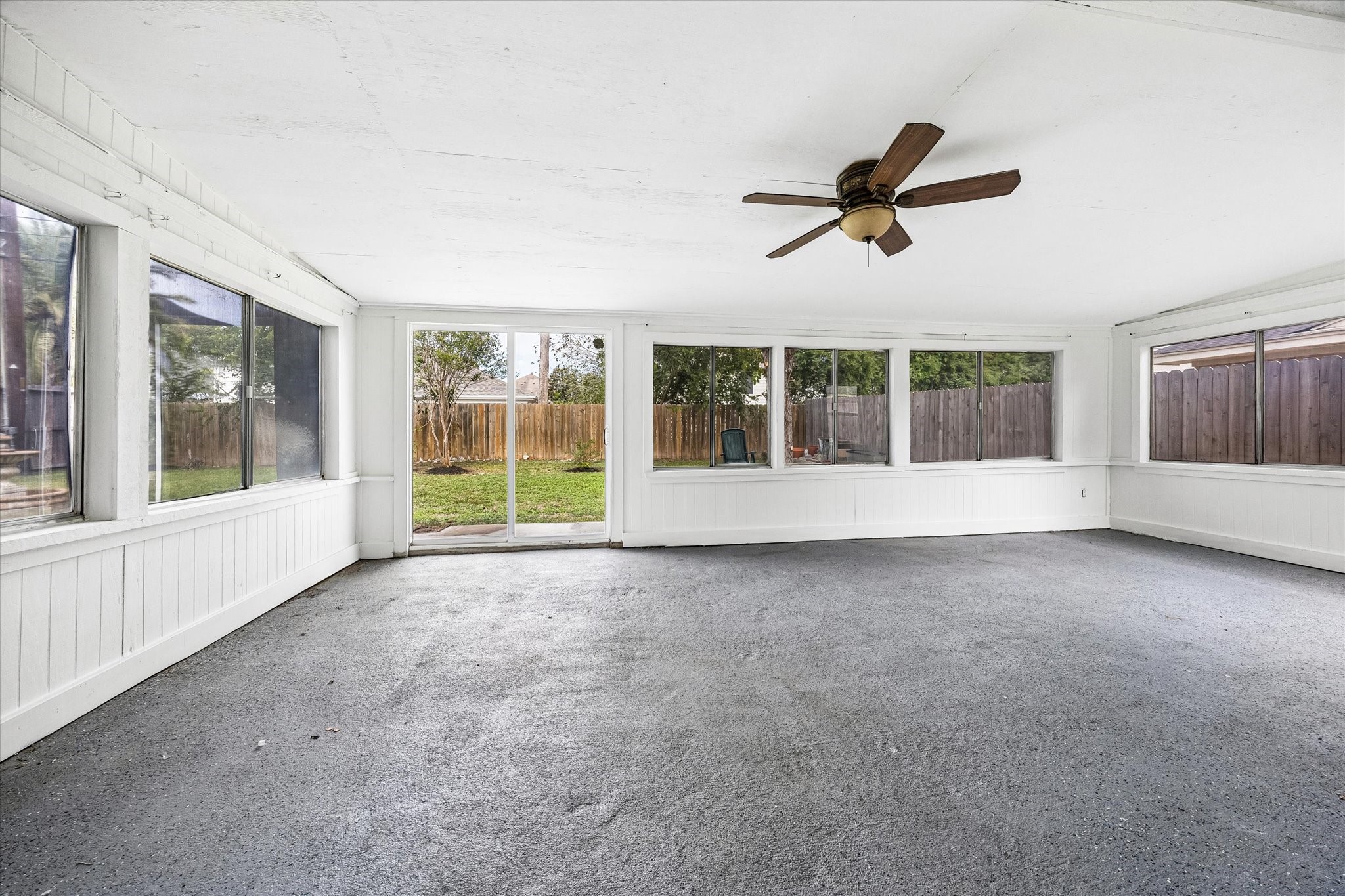 A versatile indoor patio offering the perfect spot to enjoy your morning coffee, unwind with a good book, or create an inviting space to gather with family and friends.